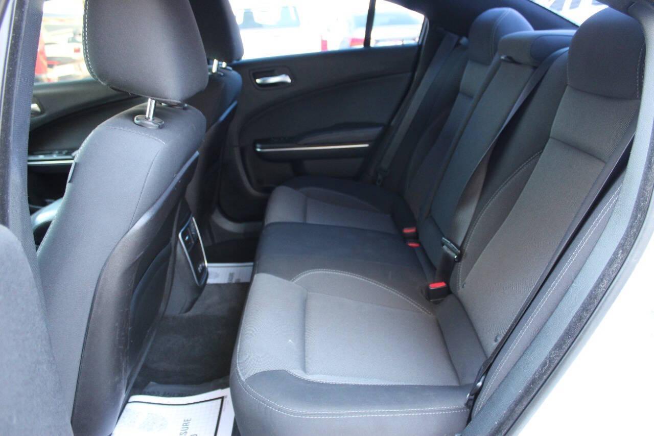 2015 White Dodge Charger SE (2C3CDXBG8FH) with an 3.6L V6 DOHC 24V engine, 8-Speed Automatic transmission, located at 4301 NW 39th , Oklahoma City, OK, 73112, (405) 949-5600, 35.512135, -97.598671 - NO DRIVERS LICENCE -NO FULL COVERAGE INSURANCE - NO CREDIT CHECK. COME ON OVER TO SUPERSPORTS, TAKE A LOOK AND TEST DRIVE. PLEASE GIVE US A CALL AT (405) 949-5600. NO LICENCIA DE CONDUCIR - NO SEGURO DE COBERTURA TOTAL - NO VERIFICACION DE CREDITO. VISITENOS EN SUPERSPORTS, MIRE NUESTRO - Photo#13