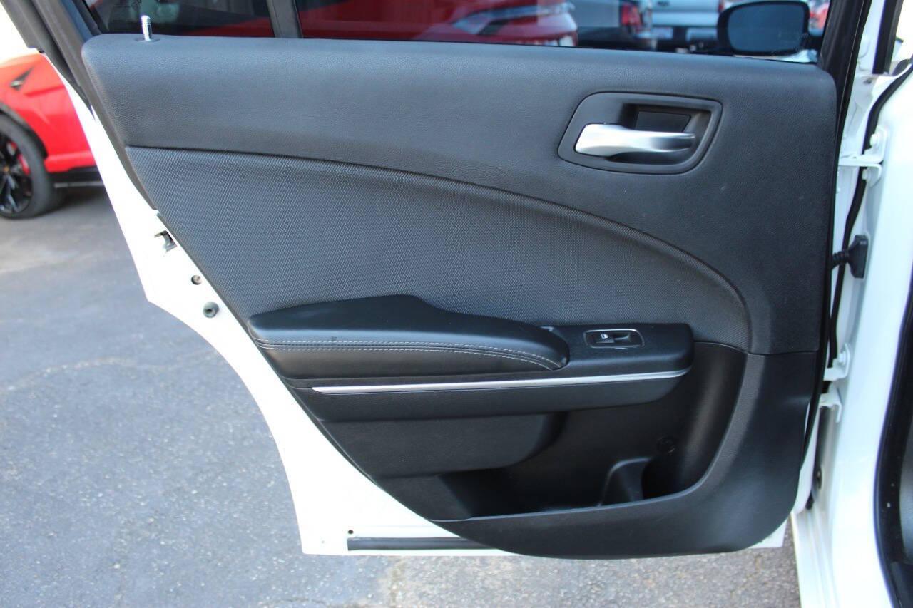 2015 White Dodge Charger SE (2C3CDXBG8FH) with an 3.6L V6 DOHC 24V engine, 8-Speed Automatic transmission, located at 4301 NW 39th , Oklahoma City, OK, 73112, (405) 949-5600, 35.512135, -97.598671 - NO DRIVERS LICENCE -NO FULL COVERAGE INSURANCE - NO CREDIT CHECK. COME ON OVER TO SUPERSPORTS, TAKE A LOOK AND TEST DRIVE. PLEASE GIVE US A CALL AT (405) 949-5600. NO LICENCIA DE CONDUCIR - NO SEGURO DE COBERTURA TOTAL - NO VERIFICACION DE CREDITO. VISITENOS EN SUPERSPORTS, MIRE NUESTRO - Photo#14