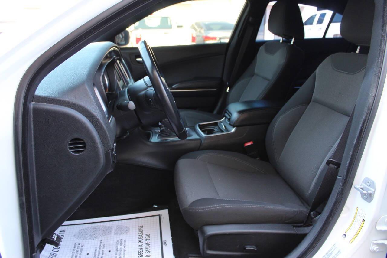 2015 White Dodge Charger SE (2C3CDXBG8FH) with an 3.6L V6 DOHC 24V engine, 8-Speed Automatic transmission, located at 4301 NW 39th , Oklahoma City, OK, 73112, (405) 949-5600, 35.512135, -97.598671 - NO DRIVERS LICENCE -NO FULL COVERAGE INSURANCE - NO CREDIT CHECK. COME ON OVER TO SUPERSPORTS, TAKE A LOOK AND TEST DRIVE. PLEASE GIVE US A CALL AT (405) 949-5600. NO LICENCIA DE CONDUCIR - NO SEGURO DE COBERTURA TOTAL - NO VERIFICACION DE CREDITO. VISITENOS EN SUPERSPORTS, MIRE NUESTRO - Photo#15