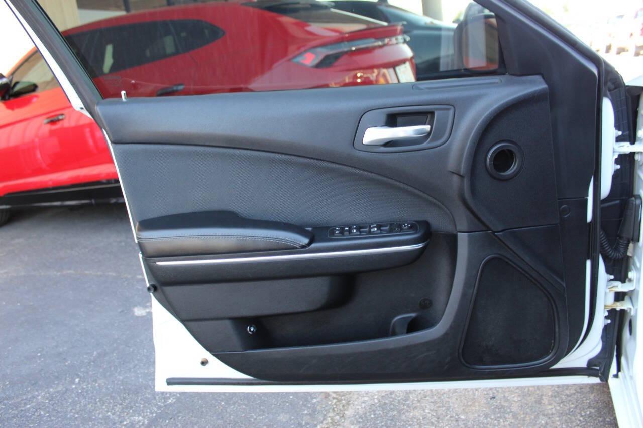 2015 White Dodge Charger SE (2C3CDXBG8FH) with an 3.6L V6 DOHC 24V engine, 8-Speed Automatic transmission, located at 4301 NW 39th , Oklahoma City, OK, 73112, (405) 949-5600, 35.512135, -97.598671 - NO DRIVERS LICENCE -NO FULL COVERAGE INSURANCE - NO CREDIT CHECK. COME ON OVER TO SUPERSPORTS, TAKE A LOOK AND TEST DRIVE. PLEASE GIVE US A CALL AT (405) 949-5600. NO LICENCIA DE CONDUCIR - NO SEGURO DE COBERTURA TOTAL - NO VERIFICACION DE CREDITO. VISITENOS EN SUPERSPORTS, MIRE NUESTRO - Photo#16