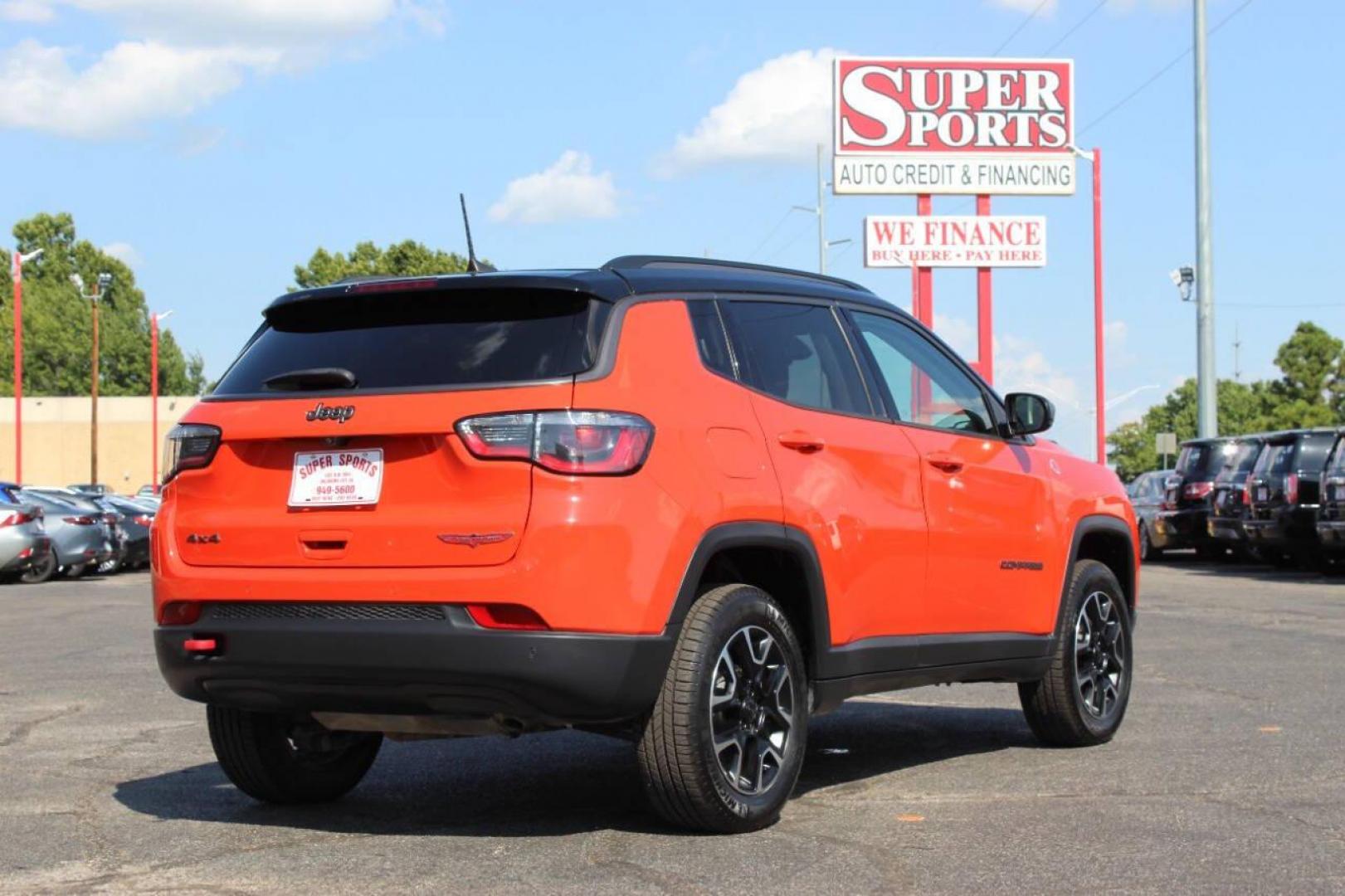 2021 Orange Jeep Compass Trailhawk 4WD (3C4NJDDB3MT) with an 2.4L L4 DOHC 16V engine, 9A transmission, located at 4301 NW 39th , Oklahoma City, OK, 73112, (405) 949-5600, 35.512135, -97.598671 - NO DRIVERS LICENCE -NO FULL COVERAGE INSURANCE - NO CREDIT CHECK. COME ON OVER TO SUPERSPORTS, TAKE A LOOK AND TEST DRIVE. PLEASE GIVE US A CALL AT (405) 949-5600. NO LICENCIA DE CONDUCIR - NO SEGURO DE COBERTURA TOTAL - NO VERIFICACION DE CREDITO. VISITENOS EN SUPERSPORTS, MIRE NUEST - Photo#3