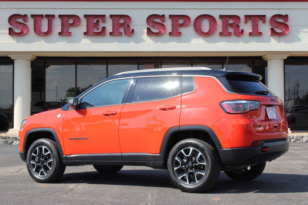 2021 Orange Jeep Compass Trailhawk 4WD (3C4NJDDB3MT) with an 2.4L L4 DOHC 16V engine, 9A transmission, located at 4301 NW 39th , Oklahoma City, OK, 73112, (405) 949-5600, 35.512135, -97.598671 - NO DRIVERS LICENCE -NO FULL COVERAGE INSURANCE - NO CREDIT CHECK. COME ON OVER TO SUPERSPORTS, TAKE A LOOK AND TEST DRIVE. PLEASE GIVE US A CALL AT (405) 949-5600. NO LICENCIA DE CONDUCIR - NO SEGURO DE COBERTURA TOTAL - NO VERIFICACION DE CREDITO. VISITENOS EN SUPERSPORTS, MIRE NUESTRO - Photo#4