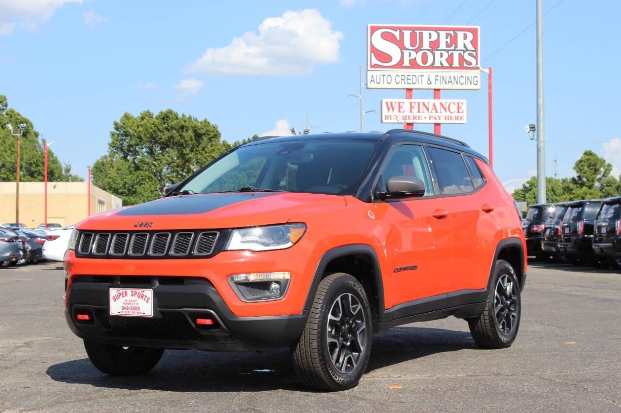 2021 Orange Jeep Compass Trailhawk 4WD (3C4NJDDB3MT) with an 2.4L L4 DOHC 16V engine, 9A transmission, located at 4301 NW 39th , Oklahoma City, OK, 73112, (405) 949-5600, 35.512135, -97.598671 - NO DRIVERS LICENCE -NO FULL COVERAGE INSURANCE - NO CREDIT CHECK. COME ON OVER TO SUPERSPORTS, TAKE A LOOK AND TEST DRIVE. PLEASE GIVE US A CALL AT (405) 949-5600. NO LICENCIA DE CONDUCIR - NO SEGURO DE COBERTURA TOTAL - NO VERIFICACION DE CREDITO. VISITENOS EN SUPERSPORTS, MIRE NUESTRO - Photo#6