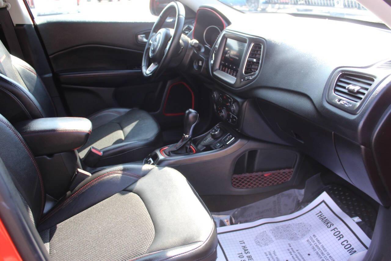 2021 Orange Jeep Compass Trailhawk 4WD (3C4NJDDB3MT) with an 2.4L L4 DOHC 16V engine, 9A transmission, located at 4301 NW 39th , Oklahoma City, OK, 73112, (405) 949-5600, 35.512135, -97.598671 - NO DRIVERS LICENCE -NO FULL COVERAGE INSURANCE - NO CREDIT CHECK. COME ON OVER TO SUPERSPORTS, TAKE A LOOK AND TEST DRIVE. PLEASE GIVE US A CALL AT (405) 949-5600. NO LICENCIA DE CONDUCIR - NO SEGURO DE COBERTURA TOTAL - NO VERIFICACION DE CREDITO. VISITENOS EN SUPERSPORTS, MIRE NUESTRO - Photo#8