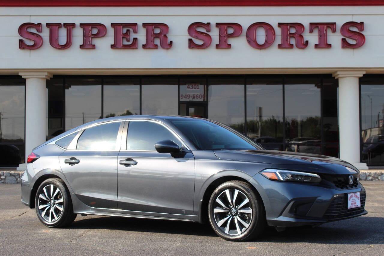 2024 Gray Honda Civic EX-L Hatchback (19XFL1H75RE) with an 1.5L I4 Turbocharger 1.5L I4 engine, CVT transmission, located at 4301 NW 39th , Oklahoma City, OK, 73112, (405) 949-5600, 35.512135, -97.598671 - NO DRIVERS LICENCE -NO FULL COVERAGE INSURANCE - NO CREDIT CHECK. COME ON OVER TO SUPERSPORTS, TAKE A LOOK AND TEST DRIVE. PLEASE GIVE US A CALL AT (405) 949-5600. NO LICENCIA DE CONDUCIR - NO SEGURO DE COBERTURA TOTAL - NO VERIFICACION DE CREDITO. VISITENOS EN SUPERSPORTS, MIRE NUESTRO - Photo#0