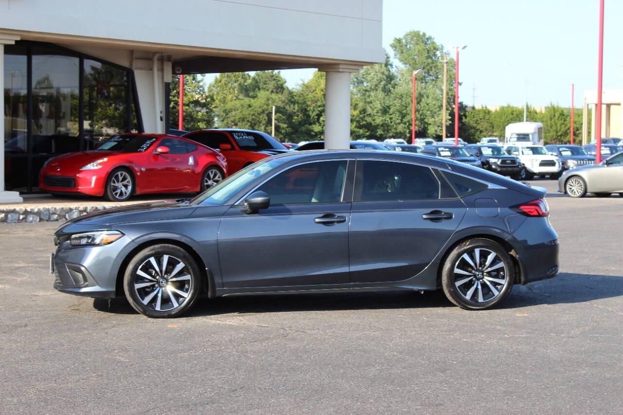 2024 Gray Honda Civic EX-L Hatchback (19XFL1H75RE) with an 1.5L I4 Turbocharger 1.5L I4 engine, CVT transmission, located at 4301 NW 39th , Oklahoma City, OK, 73112, (405) 949-5600, 35.512135, -97.598671 - NO DRIVERS LICENCE -NO FULL COVERAGE INSURANCE - NO CREDIT CHECK. COME ON OVER TO SUPERSPORTS, TAKE A LOOK AND TEST DRIVE. PLEASE GIVE US A CALL AT (405) 949-5600. NO LICENCIA DE CONDUCIR - NO SEGURO DE COBERTURA TOTAL - NO VERIFICACION DE CREDITO. VISITENOS EN SUPERSPORTS, MIRE NUESTRO - Photo#5