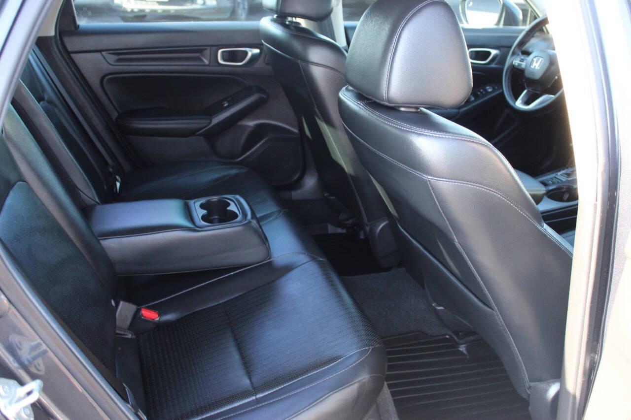 2024 Gray Honda Civic EX-L Hatchback (19XFL1H75RE) with an 1.5L I4 Turbocharger 1.5L I4 engine, CVT transmission, located at 4301 NW 39th , Oklahoma City, OK, 73112, (405) 949-5600, 35.512135, -97.598671 - NO DRIVERS LICENCE -NO FULL COVERAGE INSURANCE - NO CREDIT CHECK. COME ON OVER TO SUPERSPORTS, TAKE A LOOK AND TEST DRIVE. PLEASE GIVE US A CALL AT (405) 949-5600. NO LICENCIA DE CONDUCIR - NO SEGURO DE COBERTURA TOTAL - NO VERIFICACION DE CREDITO. VISITENOS EN SUPERSPORTS, MIRE NUESTRO - Photo#10