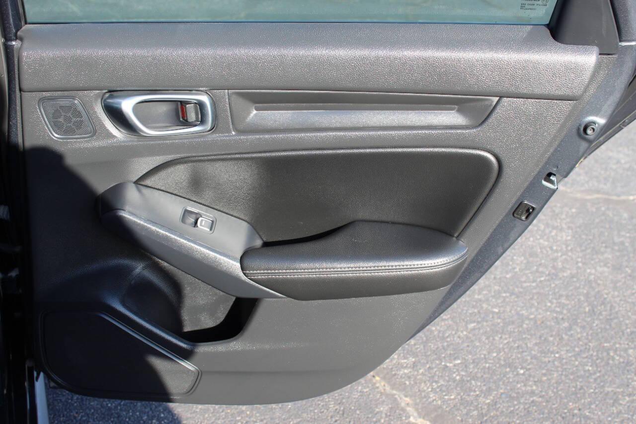 2024 Gray Honda Civic EX-L Hatchback (19XFL1H75RE) with an 1.5L I4 Turbocharger 1.5L I4 engine, CVT transmission, located at 4301 NW 39th , Oklahoma City, OK, 73112, (405) 949-5600, 35.512135, -97.598671 - NO DRIVERS LICENCE -NO FULL COVERAGE INSURANCE - NO CREDIT CHECK. COME ON OVER TO SUPERSPORTS, TAKE A LOOK AND TEST DRIVE. PLEASE GIVE US A CALL AT (405) 949-5600. NO LICENCIA DE CONDUCIR - NO SEGURO DE COBERTURA TOTAL - NO VERIFICACION DE CREDITO. VISITENOS EN SUPERSPORTS, MIRE NUESTRO - Photo#11