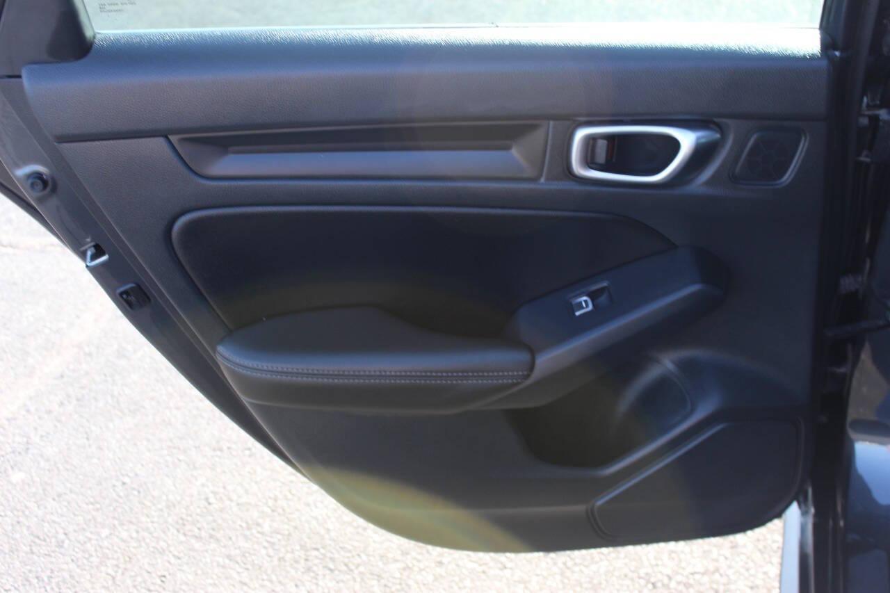 2024 Gray Honda Civic EX-L Hatchback (19XFL1H75RE) with an 1.5L I4 Turbocharger 1.5L I4 engine, CVT transmission, located at 4301 NW 39th , Oklahoma City, OK, 73112, (405) 949-5600, 35.512135, -97.598671 - NO DRIVERS LICENCE -NO FULL COVERAGE INSURANCE - NO CREDIT CHECK. COME ON OVER TO SUPERSPORTS, TAKE A LOOK AND TEST DRIVE. PLEASE GIVE US A CALL AT (405) 949-5600. NO LICENCIA DE CONDUCIR - NO SEGURO DE COBERTURA TOTAL - NO VERIFICACION DE CREDITO. VISITENOS EN SUPERSPORTS, MIRE NUESTRO - Photo#14