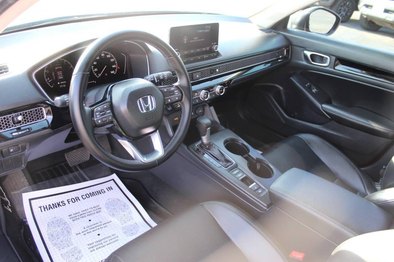 2024 Gray Honda Civic EX-L Hatchback (19XFL1H75RE) with an 1.5L I4 Turbocharger 1.5L I4 engine, CVT transmission, located at 4301 NW 39th , Oklahoma City, OK, 73112, (405) 949-5600, 35.512135, -97.598671 - NO DRIVERS LICENCE -NO FULL COVERAGE INSURANCE - NO CREDIT CHECK. COME ON OVER TO SUPERSPORTS, TAKE A LOOK AND TEST DRIVE. PLEASE GIVE US A CALL AT (405) 949-5600. NO LICENCIA DE CONDUCIR - NO SEGURO DE COBERTURA TOTAL - NO VERIFICACION DE CREDITO. VISITENOS EN SUPERSPORTS, MIRE NUESTRO - Photo#15