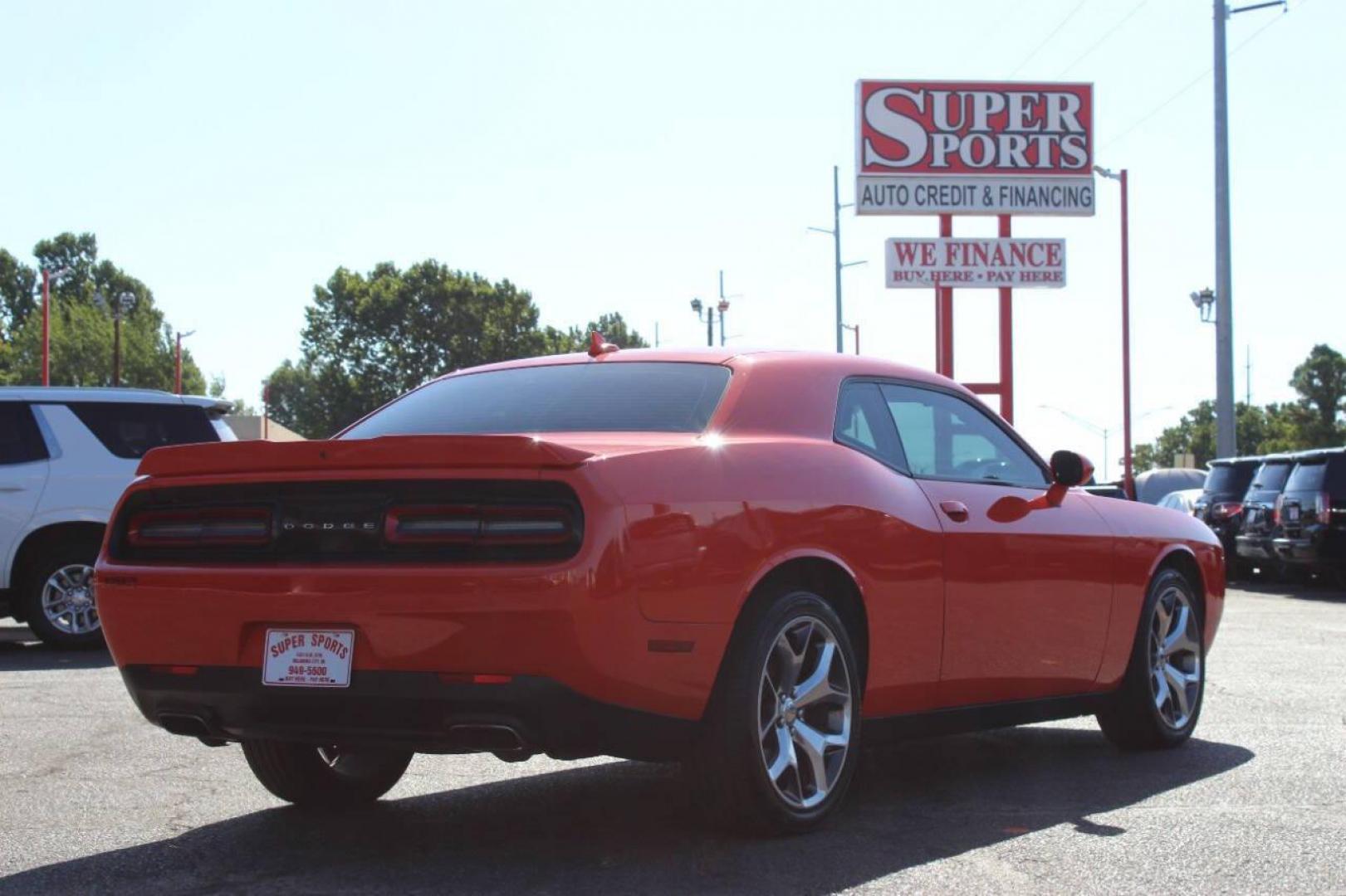 2016 Orange Dodge Challenger SXT (2C3CDZAG5GH) with an 3.6L V6 DOHC 24V engine, 5A transmission, located at 4301 NW 39th , Oklahoma City, OK, 73112, (405) 949-5600, 35.512135, -97.598671 - NO DRIVERS LICENCE -NO FULL COVERAGE INSURANCE - NO CREDIT CHECK. COME ON OVER TO SUPERSPORTS, TAKE A LOOK AND TEST DRIVE. PLEASE GIVE US A CALL AT (405) 949-5600. NO LICENCIA DE CONDUCIR - NO SEGURO DE COBERTURA TOTAL - NO VERIFICACION DE CREDITO. VISITENOS EN SUPERSPORTS, MIRE NUESTRO - Photo#3