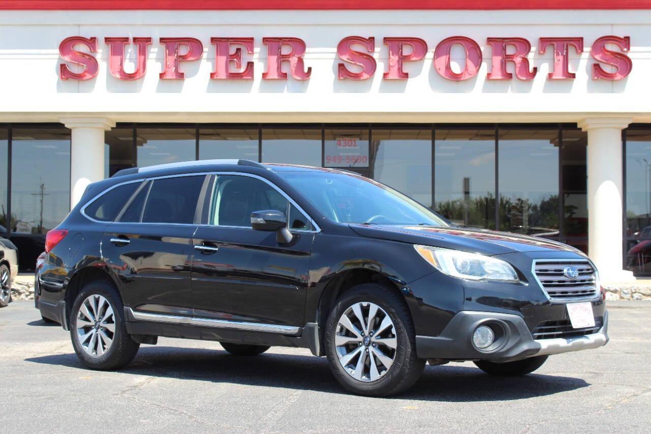 2017 Black Subaru Outback 2.5i Touring (4S4BSETC4H3) with an 2.5L H4 DOHC 16V engine, 6A transmission, located at 4301 NW 39th , Oklahoma City, OK, 73112, (405) 949-5600, 35.512135, -97.598671 - NO DRIVERS LICENCE -NO FULL COVERAGE INSURANCE - NO CREDIT CHECK. COME ON OVER TO SUPERSPORTS, TAKE A LOOK AND TEST DRIVE. PLEASE GIVE US A CALL AT (405) 949-5600. NO LICENCIA DE CONDUCIR - NO SEGURO DE COBERTURA TOTAL - NO VERIFICACION DE CREDITO. VISITENOS EN SUPERSPORTS, MIRE NUESTRO - Photo#0