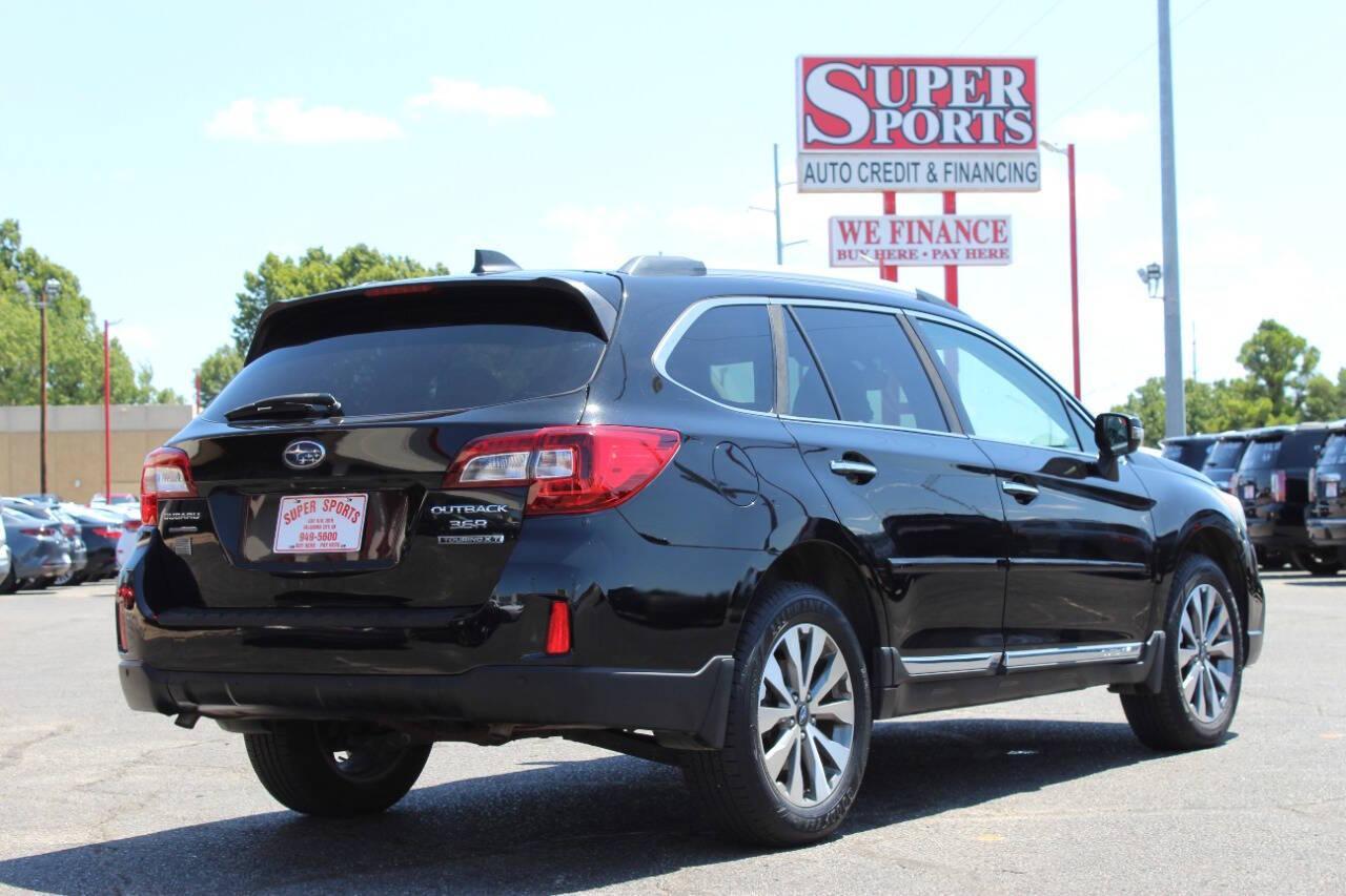 2017 Black Subaru Outback 2.5i Touring (4S4BSETC4H3) with an 2.5L H4 DOHC 16V engine, 6A transmission, located at 4301 NW 39th , Oklahoma City, OK, 73112, (405) 949-5600, 35.512135, -97.598671 - NO DRIVERS LICENCE -NO FULL COVERAGE INSURANCE - NO CREDIT CHECK. COME ON OVER TO SUPERSPORTS, TAKE A LOOK AND TEST DRIVE. PLEASE GIVE US A CALL AT (405) 949-5600. NO LICENCIA DE CONDUCIR - NO SEGURO DE COBERTURA TOTAL - NO VERIFICACION DE CREDITO. VISITENOS EN SUPERSPORTS, MIRE NUESTRO - Photo#3
