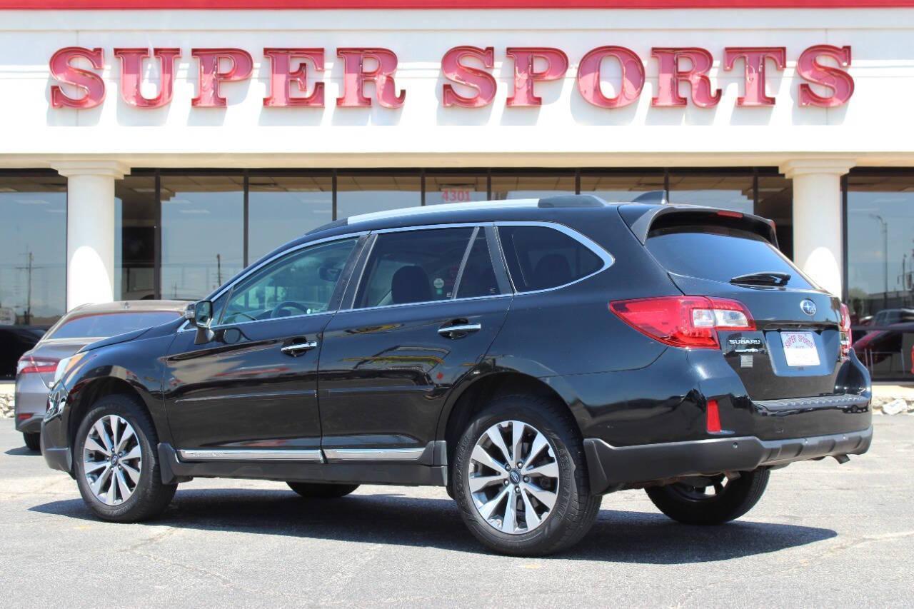 2017 Black Subaru Outback 2.5i Touring (4S4BSETC4H3) with an 2.5L H4 DOHC 16V engine, 6A transmission, located at 4301 NW 39th , Oklahoma City, OK, 73112, (405) 949-5600, 35.512135, -97.598671 - NO DRIVERS LICENCE -NO FULL COVERAGE INSURANCE - NO CREDIT CHECK. COME ON OVER TO SUPERSPORTS, TAKE A LOOK AND TEST DRIVE. PLEASE GIVE US A CALL AT (405) 949-5600. NO LICENCIA DE CONDUCIR - NO SEGURO DE COBERTURA TOTAL - NO VERIFICACION DE CREDITO. VISITENOS EN SUPERSPORTS, MIRE NUESTRO - Photo#4