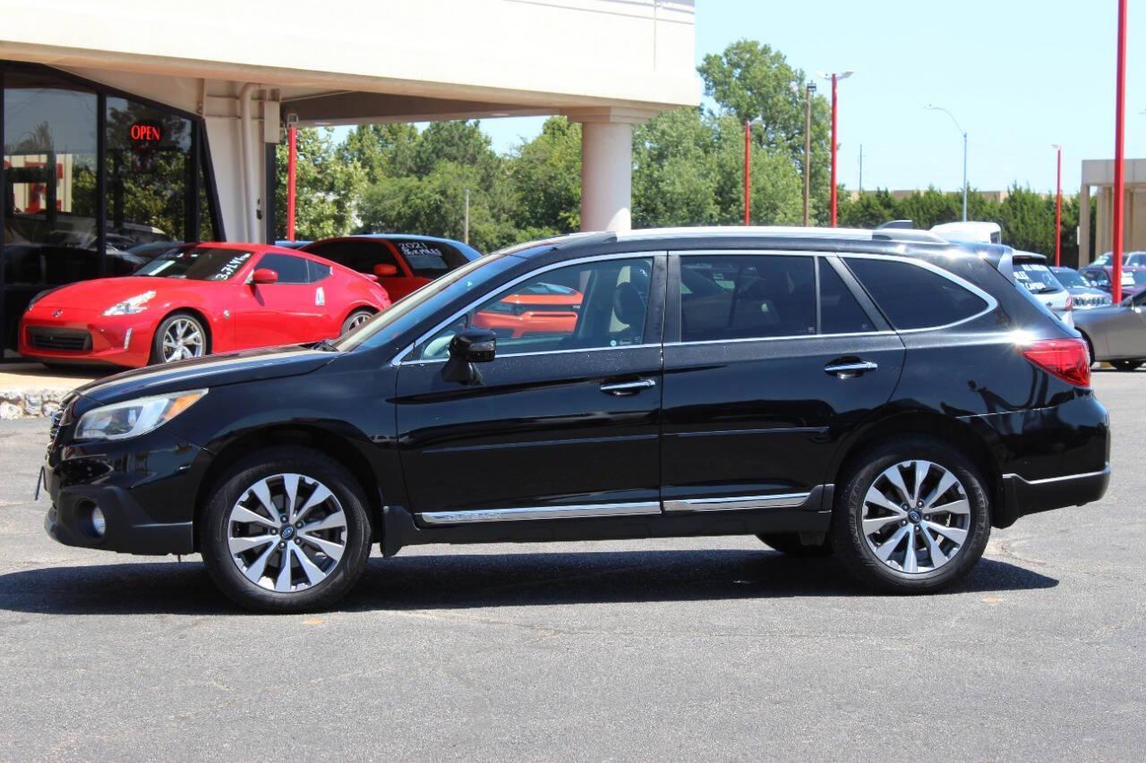 2017 Black Subaru Outback 2.5i Touring (4S4BSETC4H3) with an 2.5L H4 DOHC 16V engine, 6A transmission, located at 4301 NW 39th , Oklahoma City, OK, 73112, (405) 949-5600, 35.512135, -97.598671 - NO DRIVERS LICENCE -NO FULL COVERAGE INSURANCE - NO CREDIT CHECK. COME ON OVER TO SUPERSPORTS, TAKE A LOOK AND TEST DRIVE. PLEASE GIVE US A CALL AT (405) 949-5600. NO LICENCIA DE CONDUCIR - NO SEGURO DE COBERTURA TOTAL - NO VERIFICACION DE CREDITO. VISITENOS EN SUPERSPORTS, MIRE NUESTRO - Photo#5