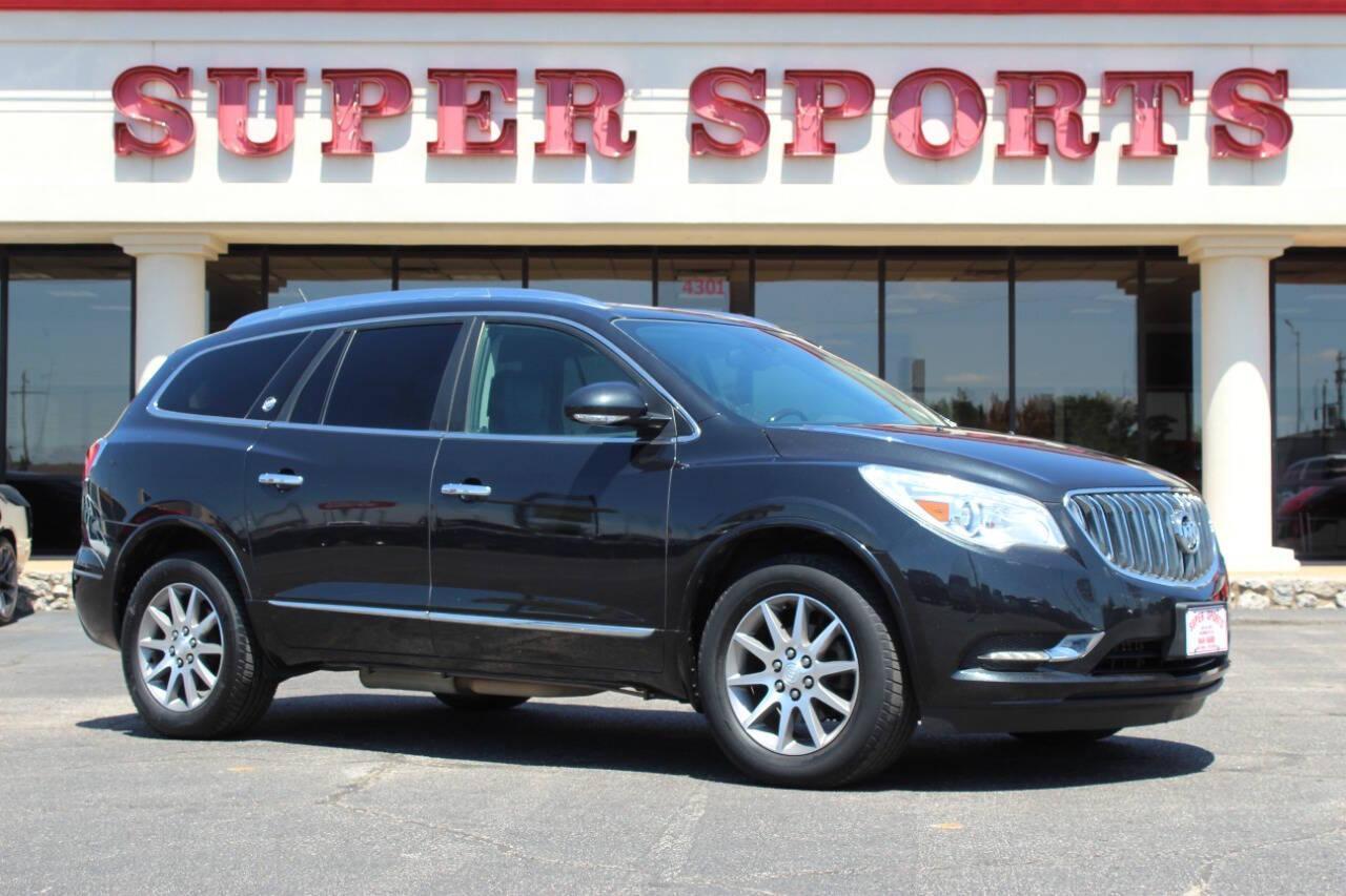 2015 Black Buick Enclave Leather FWD (5GAKRBKD0FJ) with an 3.6L V6 DOHC 24V engine, 6-Speed Automatic Overdrive transmission, located at 4301 NW 39th , Oklahoma City, OK, 73112, (405) 949-5600, 35.512135, -97.598671 - NO DRIVERS LICENCE -NO FULL COVERAGE INSURANCE - NO CREDIT CHECK. COME ON OVER TO SUPERSPORTS, TAKE A LOOK AND TEST DRIVE. PLEASE GIVE US A CALL AT (405) 949-5600. NO LICENCIA DE CONDUCIR - NO SEGURO DE COBERTURA TOTAL - NO VERIFICACION DE CREDITO. VISITENOS EN SUPERSPORTS, MIRE NUESTRO - Photo#0