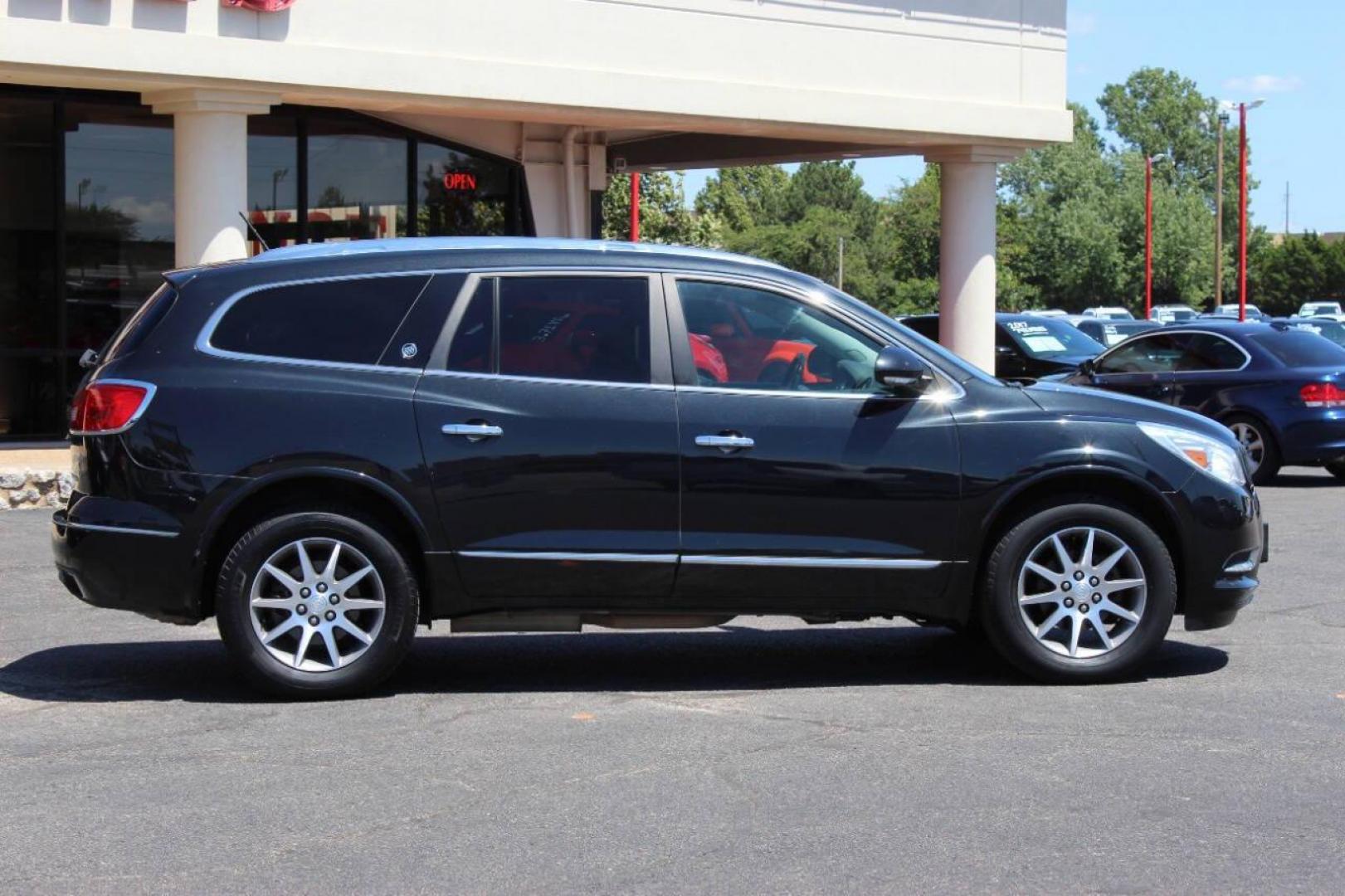 2015 Black Buick Enclave Leather FWD (5GAKRBKD0FJ) with an 3.6L V6 DOHC 24V engine, 6-Speed Automatic Overdrive transmission, located at 4301 NW 39th , Oklahoma City, OK, 73112, (405) 949-5600, 35.512135, -97.598671 - NO DRIVERS LICENCE -NO FULL COVERAGE INSURANCE - NO CREDIT CHECK. COME ON OVER TO SUPERSPORTS, TAKE A LOOK AND TEST DRIVE. PLEASE GIVE US A CALL AT (405) 949-5600. NO LICENCIA DE CONDUCIR - NO SEGURO DE COBERTURA TOTAL - NO VERIFICACION DE CREDITO. VISITENOS EN SUPERSPORTS, MIRE NUESTRO - Photo#1