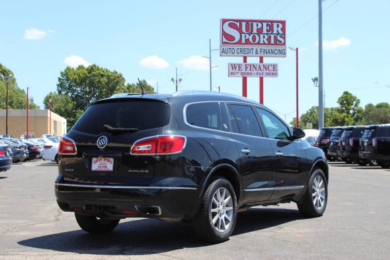 2015 Black Buick Enclave Leather FWD (5GAKRBKD0FJ) with an 3.6L V6 DOHC 24V engine, 6-Speed Automatic Overdrive transmission, located at 4301 NW 39th , Oklahoma City, OK, 73112, (405) 949-5600, 35.512135, -97.598671 - NO DRIVERS LICENCE -NO FULL COVERAGE INSURANCE - NO CREDIT CHECK. COME ON OVER TO SUPERSPORTS, TAKE A LOOK AND TEST DRIVE. PLEASE GIVE US A CALL AT (405) 949-5600. NO LICENCIA DE CONDUCIR - NO SEGURO DE COBERTURA TOTAL - NO VERIFICACION DE CREDITO. VISITENOS EN SUPERSPORTS, MIRE NUESTRO - Photo#2