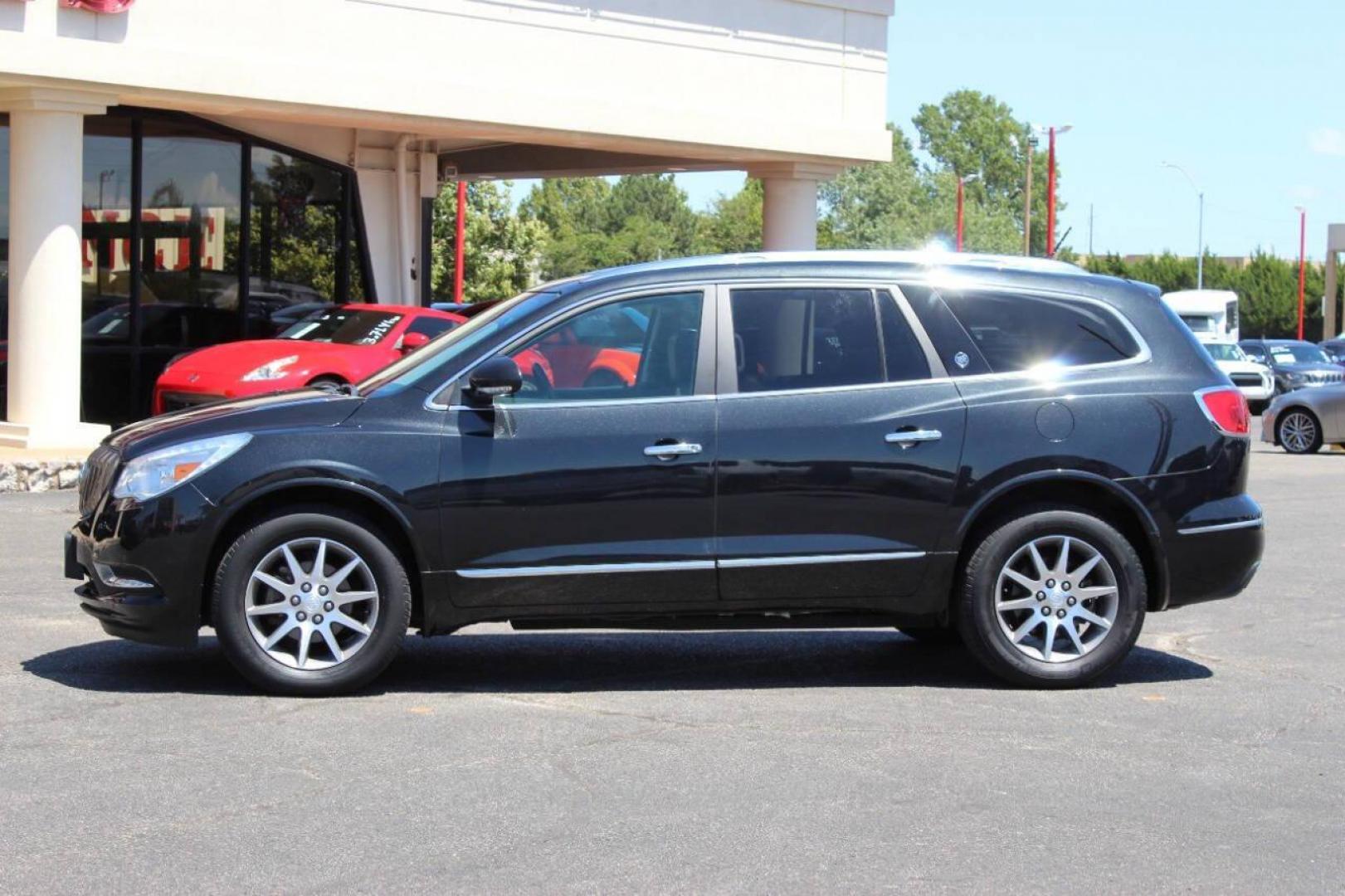 2015 Black Buick Enclave Leather FWD (5GAKRBKD0FJ) with an 3.6L V6 DOHC 24V engine, 6-Speed Automatic Overdrive transmission, located at 4301 NW 39th , Oklahoma City, OK, 73112, (405) 949-5600, 35.512135, -97.598671 - NO DRIVERS LICENCE -NO FULL COVERAGE INSURANCE - NO CREDIT CHECK. COME ON OVER TO SUPERSPORTS, TAKE A LOOK AND TEST DRIVE. PLEASE GIVE US A CALL AT (405) 949-5600. NO LICENCIA DE CONDUCIR - NO SEGURO DE COBERTURA TOTAL - NO VERIFICACION DE CREDITO. VISITENOS EN SUPERSPORTS, MIRE NUESTRO - Photo#4