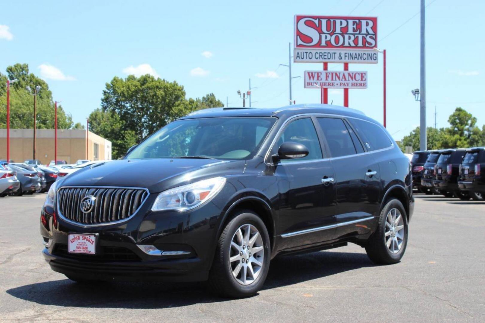 2015 Black Buick Enclave Leather FWD (5GAKRBKD0FJ) with an 3.6L V6 DOHC 24V engine, 6-Speed Automatic Overdrive transmission, located at 4301 NW 39th , Oklahoma City, OK, 73112, (405) 949-5600, 35.512135, -97.598671 - NO DRIVERS LICENCE -NO FULL COVERAGE INSURANCE - NO CREDIT CHECK. COME ON OVER TO SUPERSPORTS, TAKE A LOOK AND TEST DRIVE. PLEASE GIVE US A CALL AT (405) 949-5600. NO LICENCIA DE CONDUCIR - NO SEGURO DE COBERTURA TOTAL - NO VERIFICACION DE CREDITO. VISITENOS EN SUPERSPORTS, MIRE NUESTRO - Photo#5