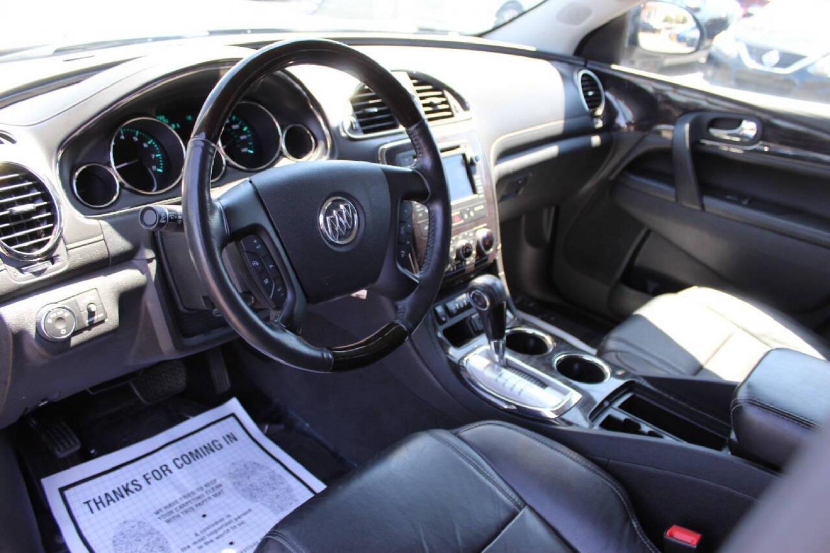 2015 Black Buick Enclave Leather FWD (5GAKRBKD0FJ) with an 3.6L V6 DOHC 24V engine, 6-Speed Automatic Overdrive transmission, located at 4301 NW 39th , Oklahoma City, OK, 73112, (405) 949-5600, 35.512135, -97.598671 - NO DRIVERS LICENCE -NO FULL COVERAGE INSURANCE - NO CREDIT CHECK. COME ON OVER TO SUPERSPORTS, TAKE A LOOK AND TEST DRIVE. PLEASE GIVE US A CALL AT (405) 949-5600. NO LICENCIA DE CONDUCIR - NO SEGURO DE COBERTURA TOTAL - NO VERIFICACION DE CREDITO. VISITENOS EN SUPERSPORTS, MIRE NUESTRO - Photo#17