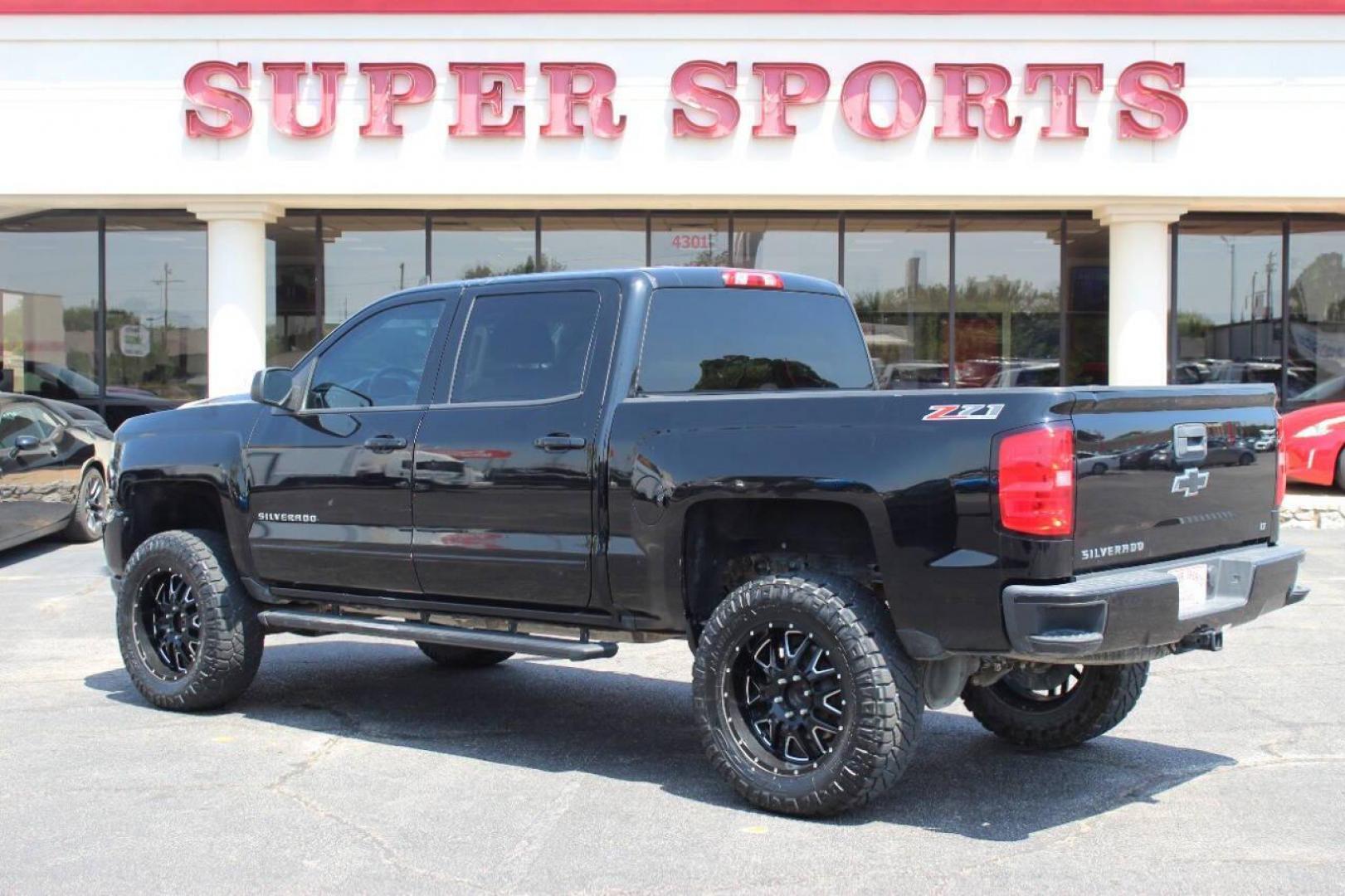 2016 Black Chevrolet Silverado 1500 LT Crew Cab 4WD (3GCUKREC8GG) with an 5.3L V8 OHV 16V engine, 6A transmission, located at 4301 NW 39th , Oklahoma City, OK, 73112, (405) 949-5600, 35.512135, -97.598671 - NO DRIVERS LICENCE -NO FULL COVERAGE INSURANCE - NO CREDIT CHECK. COME ON OVER TO SUPERSPORTS, TAKE A LOOK AND TEST DRIVE. PLEASE GIVE US A CALL AT (405) 949-5600. NO LICENCIA DE CONDUCIR - NO SEGURO DE COBERTURA TOTAL - NO VERIFICACION DE CREDITO. VISITENOS EN SUPERSPORTS, MIRE NUEST - Photo#4