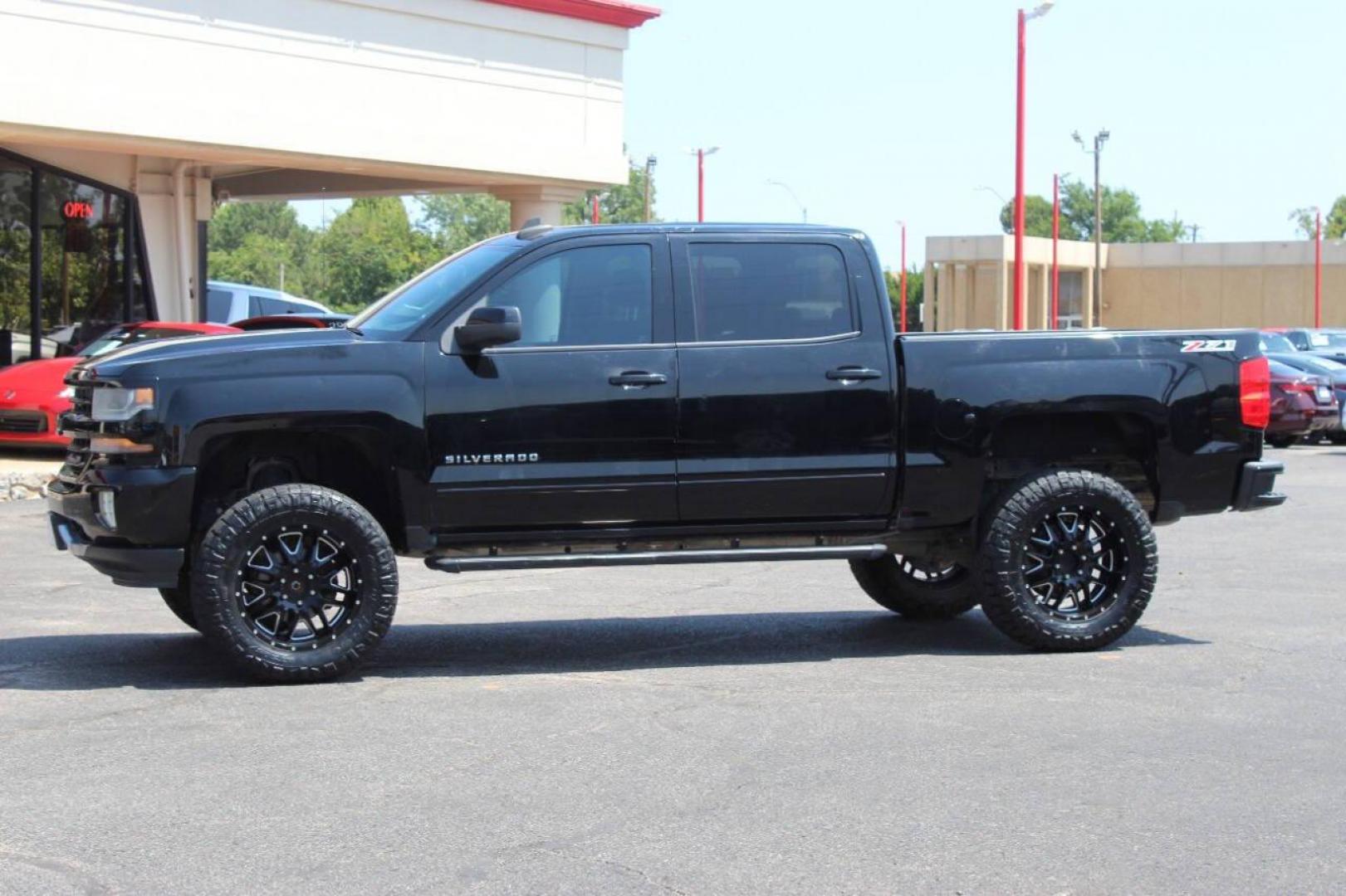 2016 Black Chevrolet Silverado 1500 LT Crew Cab 4WD (3GCUKREC8GG) with an 5.3L V8 OHV 16V engine, 6A transmission, located at 4301 NW 39th , Oklahoma City, OK, 73112, (405) 949-5600, 35.512135, -97.598671 - NO DRIVERS LICENCE -NO FULL COVERAGE INSURANCE - NO CREDIT CHECK. COME ON OVER TO SUPERSPORTS, TAKE A LOOK AND TEST DRIVE. PLEASE GIVE US A CALL AT (405) 949-5600. NO LICENCIA DE CONDUCIR - NO SEGURO DE COBERTURA TOTAL - NO VERIFICACION DE CREDITO. VISITENOS EN SUPERSPORTS, MIRE NUEST - Photo#5