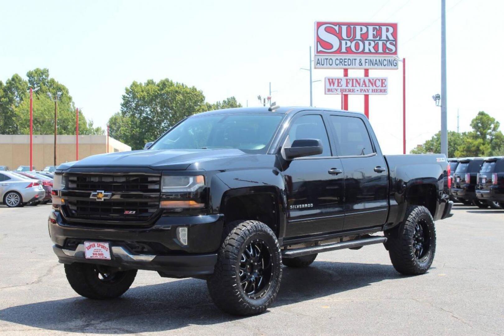 2016 Black Chevrolet Silverado 1500 LT Crew Cab 4WD (3GCUKREC8GG) with an 5.3L V8 OHV 16V engine, 6A transmission, located at 4301 NW 39th , Oklahoma City, OK, 73112, (405) 949-5600, 35.512135, -97.598671 - NO DRIVERS LICENCE -NO FULL COVERAGE INSURANCE - NO CREDIT CHECK. COME ON OVER TO SUPERSPORTS, TAKE A LOOK AND TEST DRIVE. PLEASE GIVE US A CALL AT (405) 949-5600. NO LICENCIA DE CONDUCIR - NO SEGURO DE COBERTURA TOTAL - NO VERIFICACION DE CREDITO. VISITENOS EN SUPERSPORTS, MIRE NUEST - Photo#6