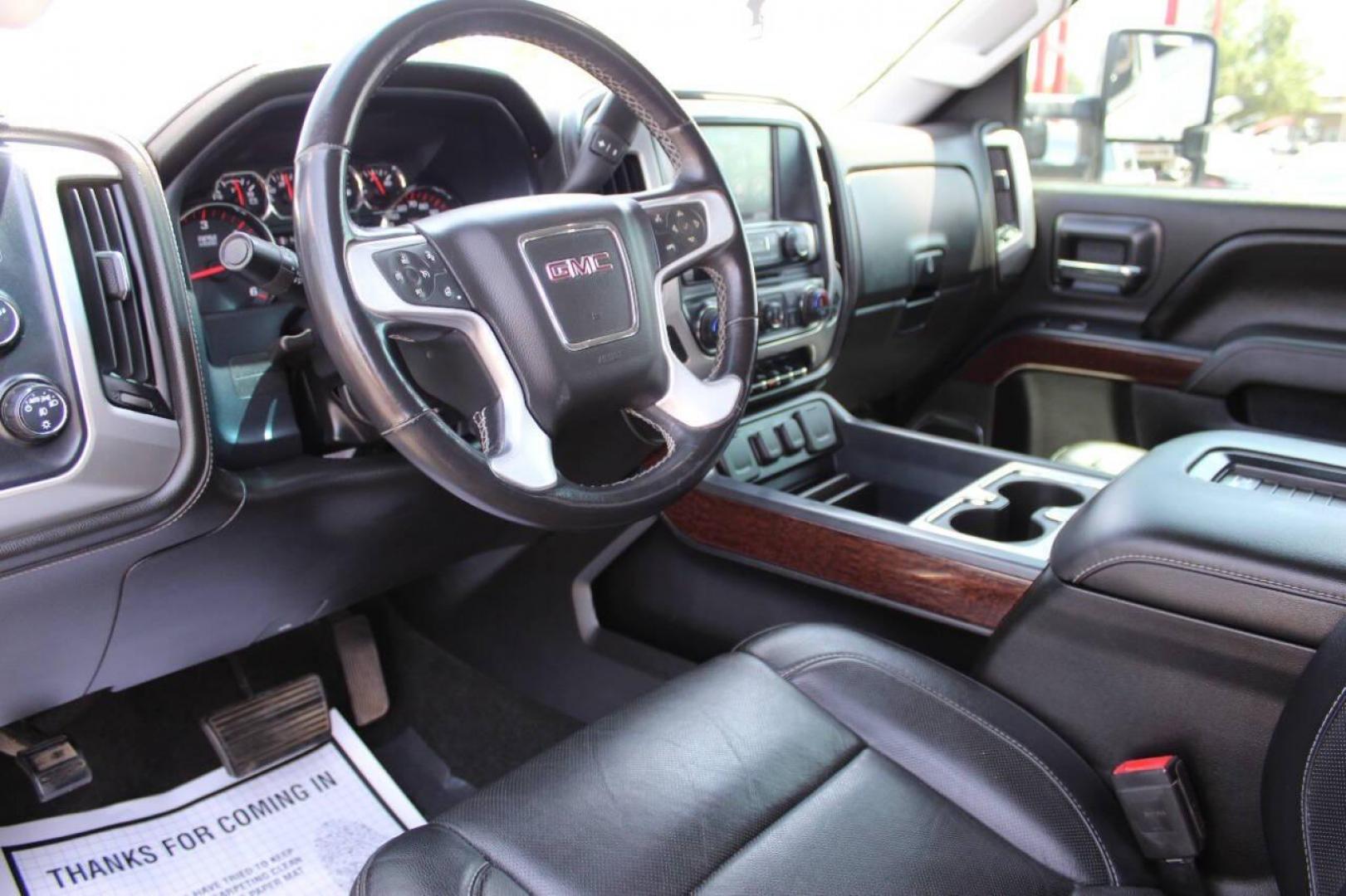 2016 Silver GMC Sierra 3500HD SLT Crew Cab 4WD (1GT12TEG9GF) with an 6.0L V8 OHV 16V FFV engine, 6A transmission, located at 4301 NW 39th , Oklahoma City, OK, 73112, (405) 949-5600, 35.512135, -97.598671 - NO DRIVERS LICENCE -NO FULL COVERAGE INSURANCE - NO CREDIT CHECK. COME ON OVER TO SUPERSPORTS, TAKE A LOOK AND TEST DRIVE. PLEASE GIVE US A CALL AT (405) 949-5600. NO LICENCIA DE CONDUCIR - NO SEGURO DE COBERTURA TOTAL - NO VERIFICACION DE CREDITO. VISITENOS EN SUPERSPORTS, MIRE NUESTRO - Photo#15
