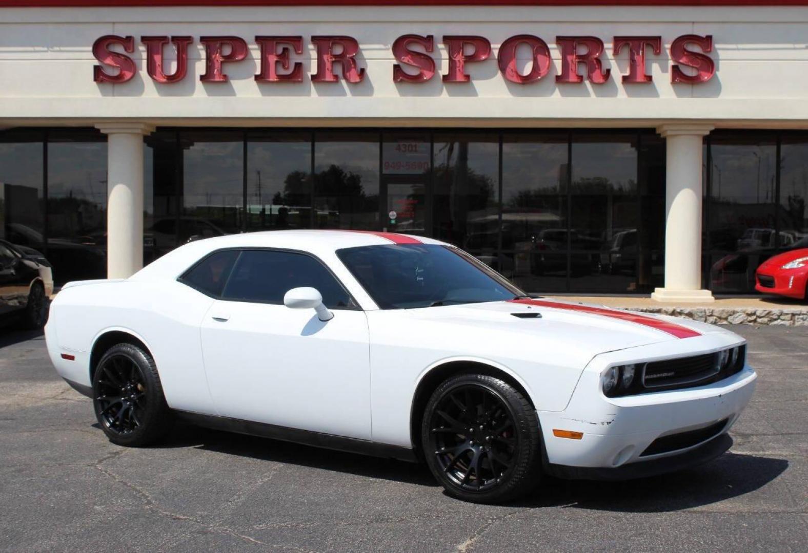 2014 White Dodge Challenger SXT (2C3CDYAG5EH) with an 3.6L V6 DOHC 24V engine, 5-Speed Automatic transmission, located at 4301 NW 39th , Oklahoma City, OK, 73112, (405) 949-5600, 35.512135, -97.598671 - NO DRIVERS LICENCE -NO FULL COVERAGE INSURANCE - NO CREDIT CHECK. COME ON OVER TO SUPERSPORTS, TAKE A LOOK AND TEST DRIVE. PLEASE GIVE US A CALL AT (405) 949-5600. NO LICENCIA DE CONDUCIR - NO SEGURO DE COBERTURA TOTAL - NO VERIFICACION DE CREDITO. VISITENOS EN SUPERSPORTS, MIRE NUESTRO - Photo#0