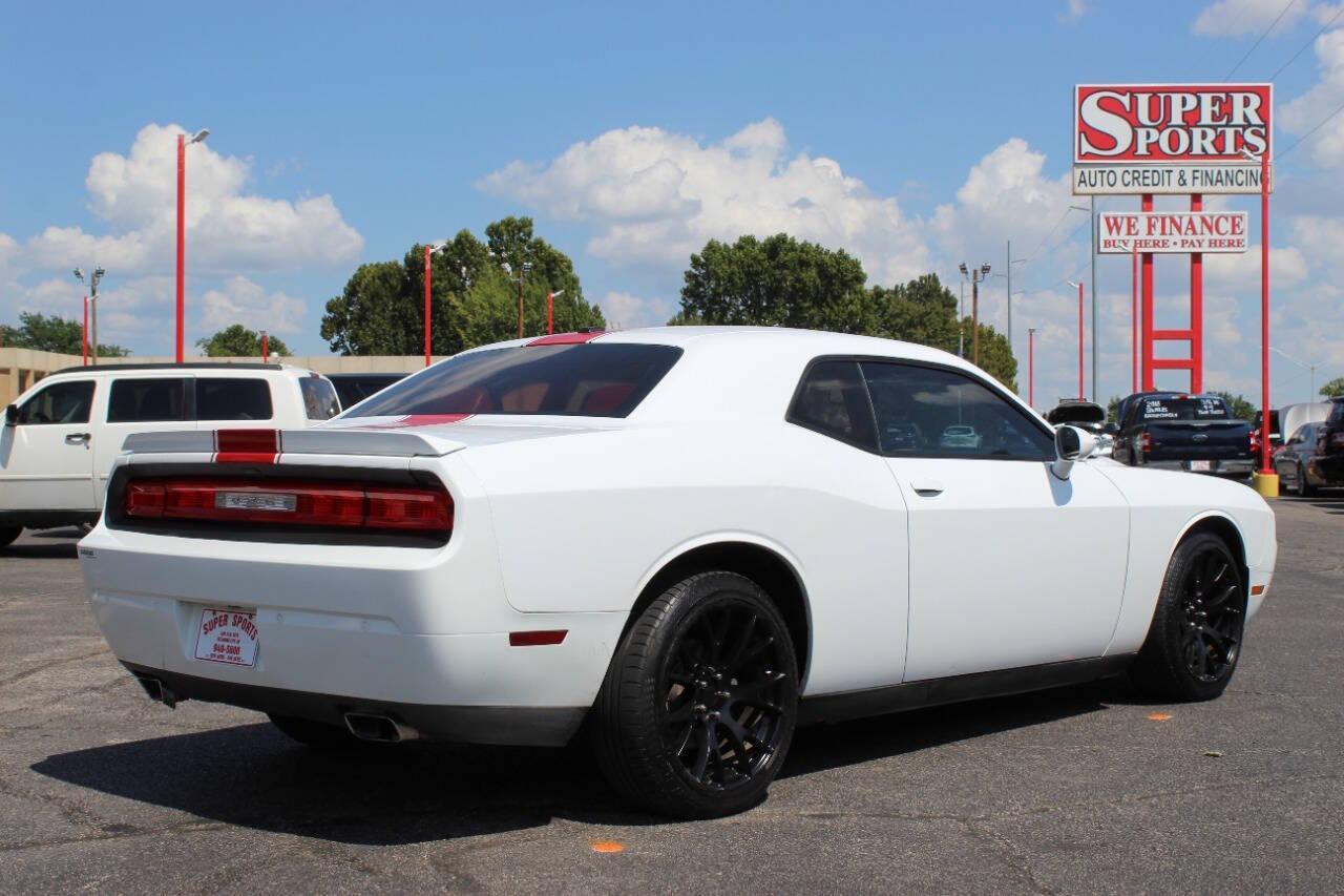 2014 White Dodge Challenger SXT (2C3CDYAG5EH) with an 3.6L V6 DOHC 24V engine, 5-Speed Automatic transmission, located at 4301 NW 39th , Oklahoma City, OK, 73112, (405) 949-5600, 35.512135, -97.598671 - NO DRIVERS LICENCE -NO FULL COVERAGE INSURANCE - NO CREDIT CHECK. COME ON OVER TO SUPERSPORTS, TAKE A LOOK AND TEST DRIVE. PLEASE GIVE US A CALL AT (405) 949-5600. NO LICENCIA DE CONDUCIR - NO SEGURO DE COBERTURA TOTAL - NO VERIFICACION DE CREDITO. VISITENOS EN SUPERSPORTS, MIRE NUESTRO - Photo#3