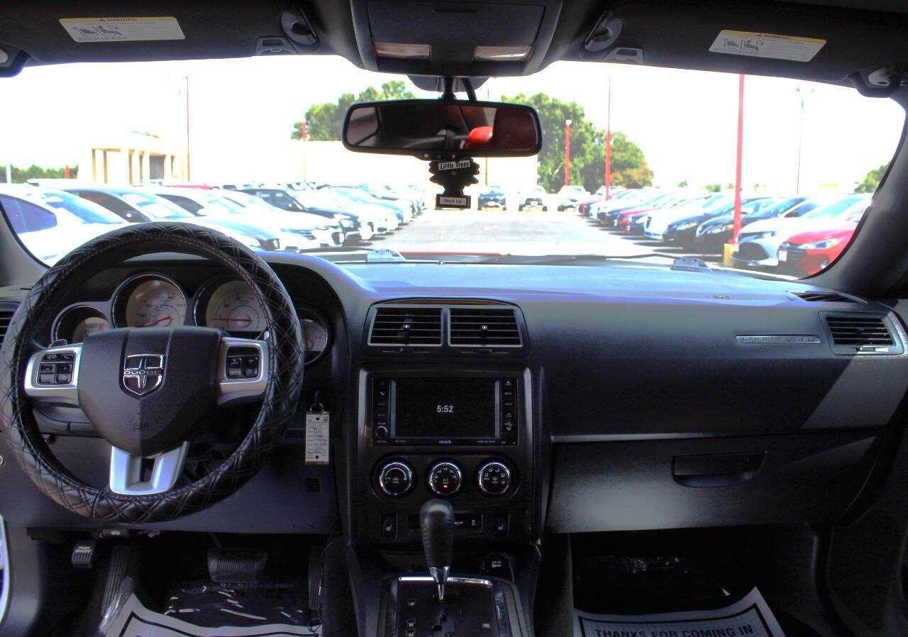 2014 White Dodge Challenger SXT (2C3CDYAG5EH) with an 3.6L V6 DOHC 24V engine, 5-Speed Automatic transmission, located at 4301 NW 39th , Oklahoma City, OK, 73112, (405) 949-5600, 35.512135, -97.598671 - NO DRIVERS LICENCE -NO FULL COVERAGE INSURANCE - NO CREDIT CHECK. COME ON OVER TO SUPERSPORTS, TAKE A LOOK AND TEST DRIVE. PLEASE GIVE US A CALL AT (405) 949-5600. NO LICENCIA DE CONDUCIR - NO SEGURO DE COBERTURA TOTAL - NO VERIFICACION DE CREDITO. VISITENOS EN SUPERSPORTS, MIRE NUESTRO - Photo#15