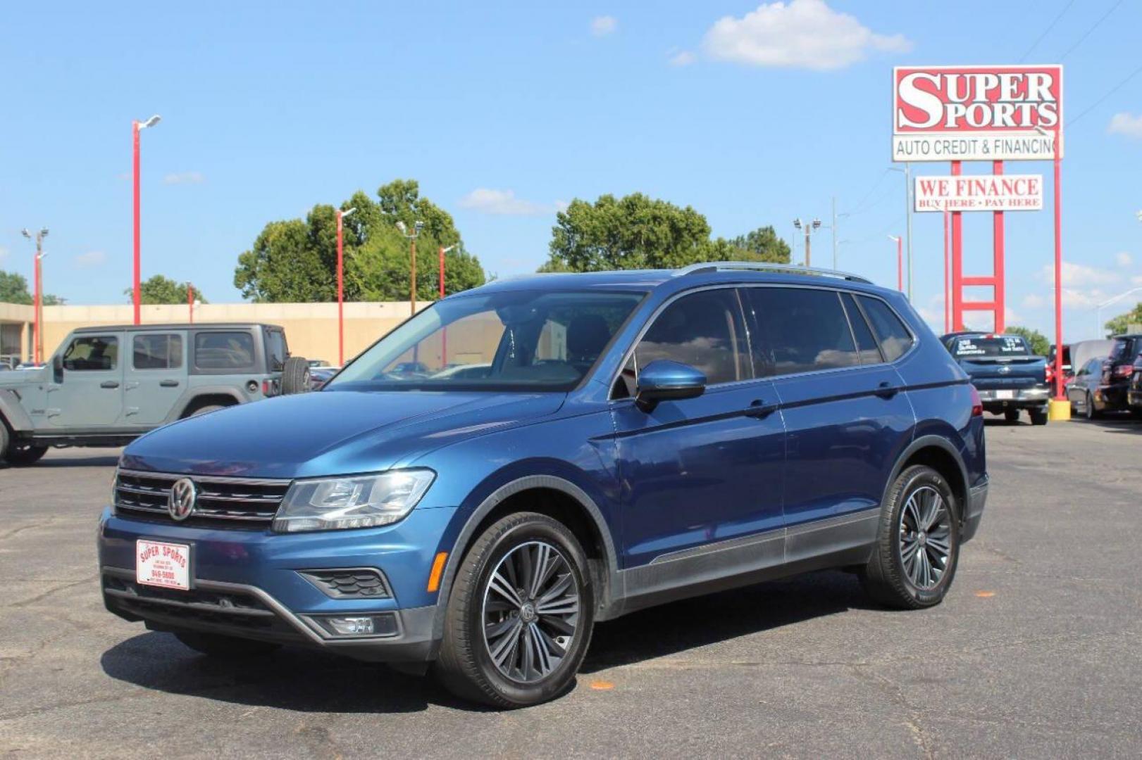 2019 Blue Volkswagen Tiguan SE (3VV3B7AX4KM) with an 2.0L L4 DOHC 16V TURBO engine, 8A transmission, located at 4301 NW 39th , Oklahoma City, OK, 73112, (405) 949-5600, 35.512135, -97.598671 - NO DRIVERS LICENCE -NO FULL COVERAGE INSURANCE - NO CREDIT CHECK. COME ON OVER TO SUPERSPORTS, TAKE A LOOK AND TEST DRIVE. PLEASE GIVE US A CALL AT (405) 949-5600. NO LICENCIA DE CONDUCIR - NO SEGURO DE COBERTURA TOTAL - NO VERIFICACION DE CREDITO. VISITENOS EN SUPERSPORTS, MIRE NUESTRO - Photo#6