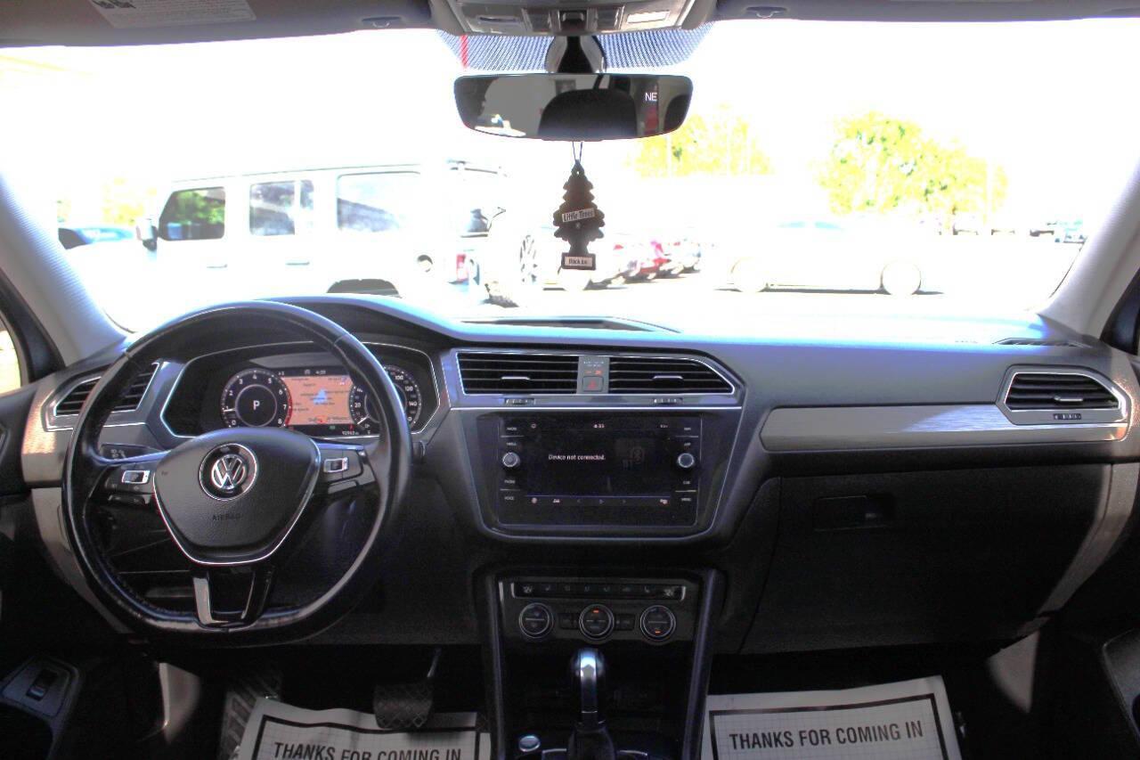 2019 Blue Volkswagen Tiguan SE (3VV3B7AX4KM) with an 2.0L L4 DOHC 16V TURBO engine, 8A transmission, located at 4301 NW 39th , Oklahoma City, OK, 73112, (405) 949-5600, 35.512135, -97.598671 - NO DRIVERS LICENCE -NO FULL COVERAGE INSURANCE - NO CREDIT CHECK. COME ON OVER TO SUPERSPORTS, TAKE A LOOK AND TEST DRIVE. PLEASE GIVE US A CALL AT (405) 949-5600. NO LICENCIA DE CONDUCIR - NO SEGURO DE COBERTURA TOTAL - NO VERIFICACION DE CREDITO. VISITENOS EN SUPERSPORTS, MIRE NUESTRO - Photo#17