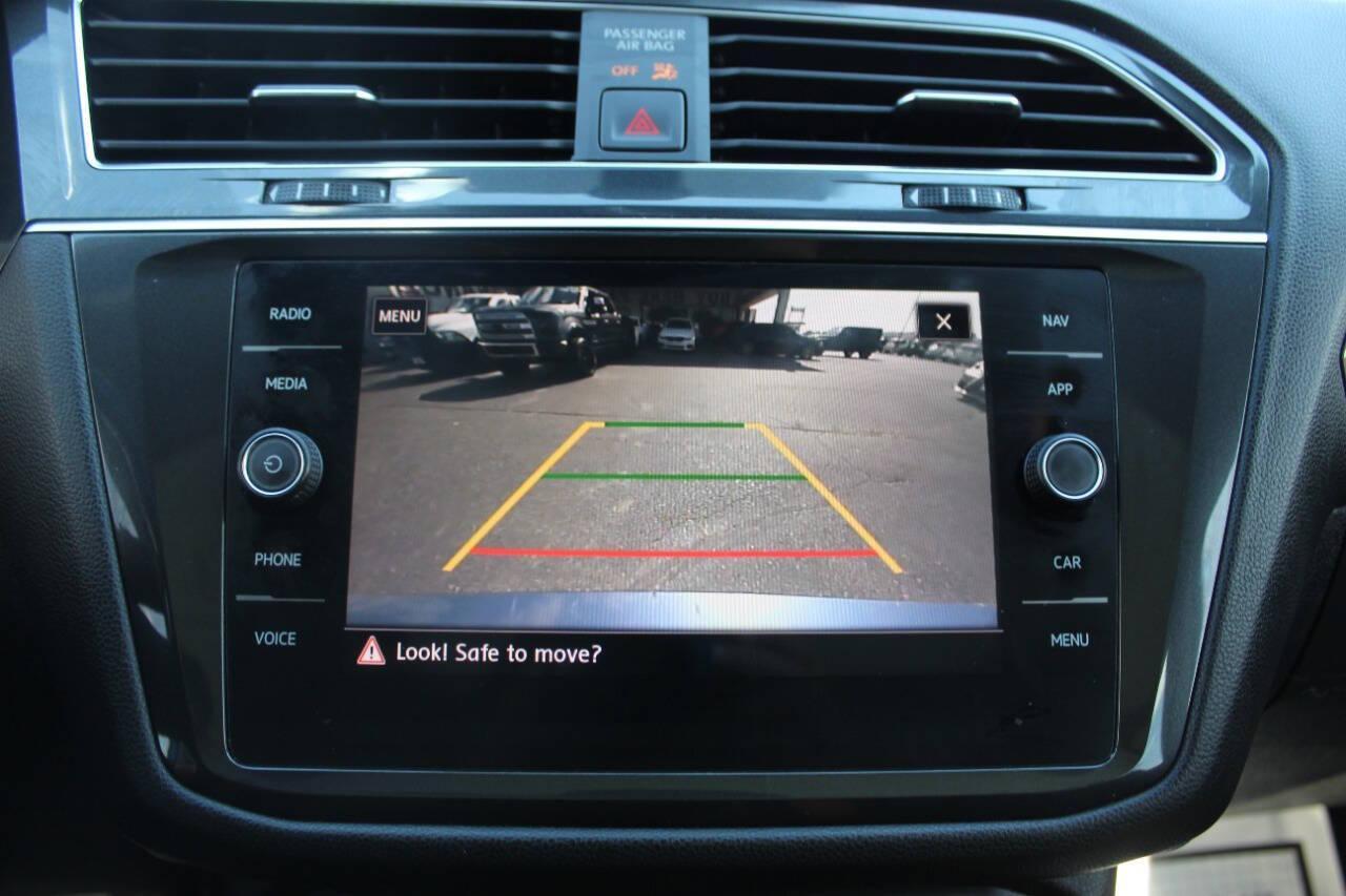 2019 Blue Volkswagen Tiguan SE (3VV3B7AX4KM) with an 2.0L L4 DOHC 16V TURBO engine, 8A transmission, located at 4301 NW 39th , Oklahoma City, OK, 73112, (405) 949-5600, 35.512135, -97.598671 - NO DRIVERS LICENCE -NO FULL COVERAGE INSURANCE - NO CREDIT CHECK. COME ON OVER TO SUPERSPORTS, TAKE A LOOK AND TEST DRIVE. PLEASE GIVE US A CALL AT (405) 949-5600. NO LICENCIA DE CONDUCIR - NO SEGURO DE COBERTURA TOTAL - NO VERIFICACION DE CREDITO. VISITENOS EN SUPERSPORTS, MIRE NUESTRO - Photo#18