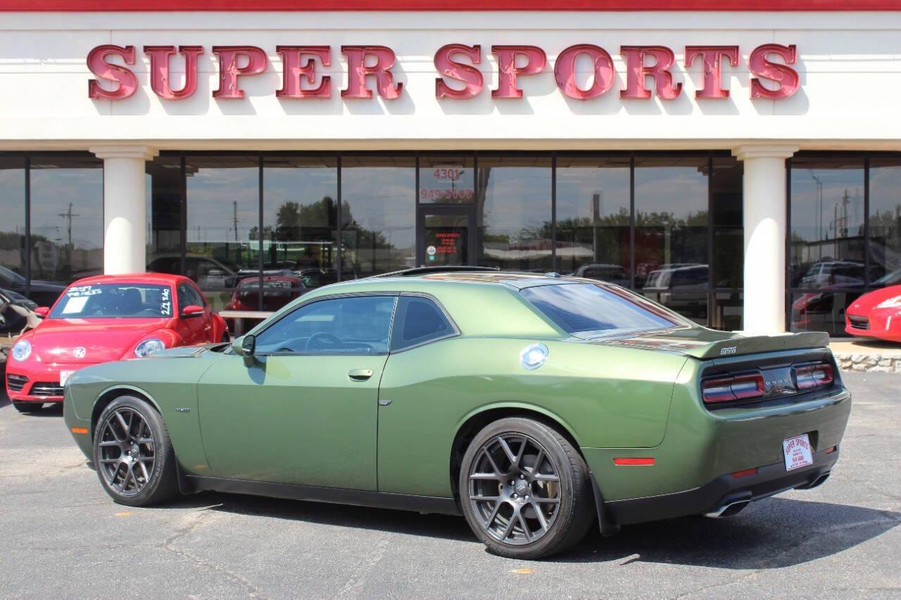 2018 Green Dodge Challenger R/T Plus (2C3CDZBT2JH) with an 5.7L V8 OHV 16V engine, 6A transmission, located at 4301 NW 39th , Oklahoma City, OK, 73112, (405) 949-5600, 35.512135, -97.598671 - NO DRIVERS LICENCE -NO FULL COVERAGE INSURANCE - NO CREDIT CHECK. COME ON OVER TO SUPERSPORTS, TAKE A LOOK AND TEST DRIVE. PLEASE GIVE US A CALL AT (405) 949-5600. NO LICENCIA DE CONDUCIR - NO SEGURO DE COBERTURA TOTAL - NO VERIFICACION DE CREDITO. VISITENOS EN SUPERSPORTS, MIRE NUESTRO - Photo#4