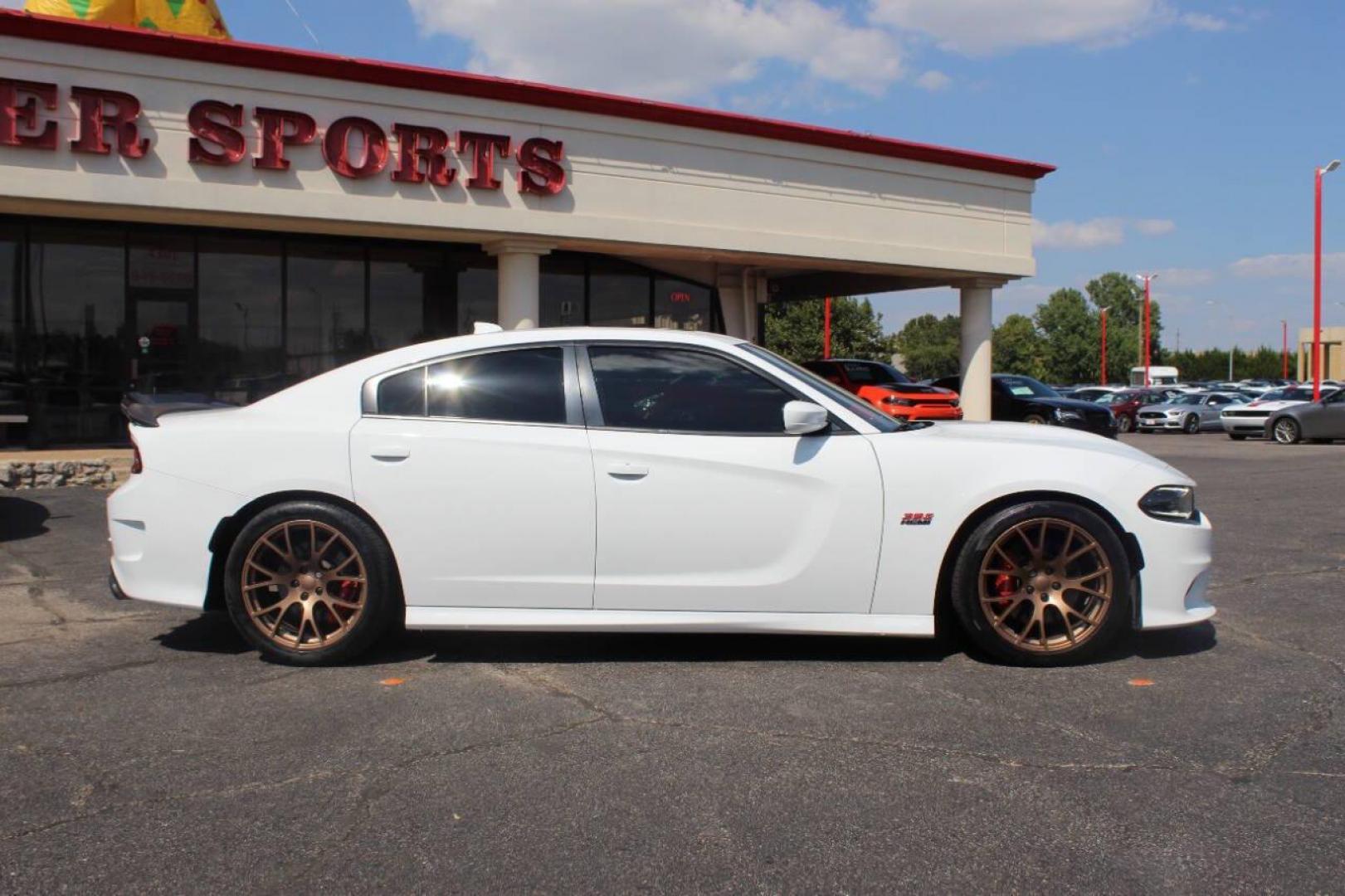 2018 White Dodge Charger SRT 392 (2C3CDXGJ8JH) with an 6.4L V8 OHV 16V engine, 5A transmission, located at 4301 NW 39th , Oklahoma City, OK, 73112, (405) 949-5600, 35.512135, -97.598671 - NO DRIVERS LICENCE -NO FULL COVERAGE INSURANCE - NO CREDIT CHECK. COME ON OVER TO SUPERSPORTS, TAKE A LOOK AND TEST DRIVE. PLEASE GIVE US A CALL AT (405) 949-5600. NO LICENCIA DE CONDUCIR - NO SEGURO DE COBERTURA TOTAL - NO VERIFICACION DE CREDITO. VISITENOS EN SUPERSPORTS, MIRE NUESTRO - Photo#2