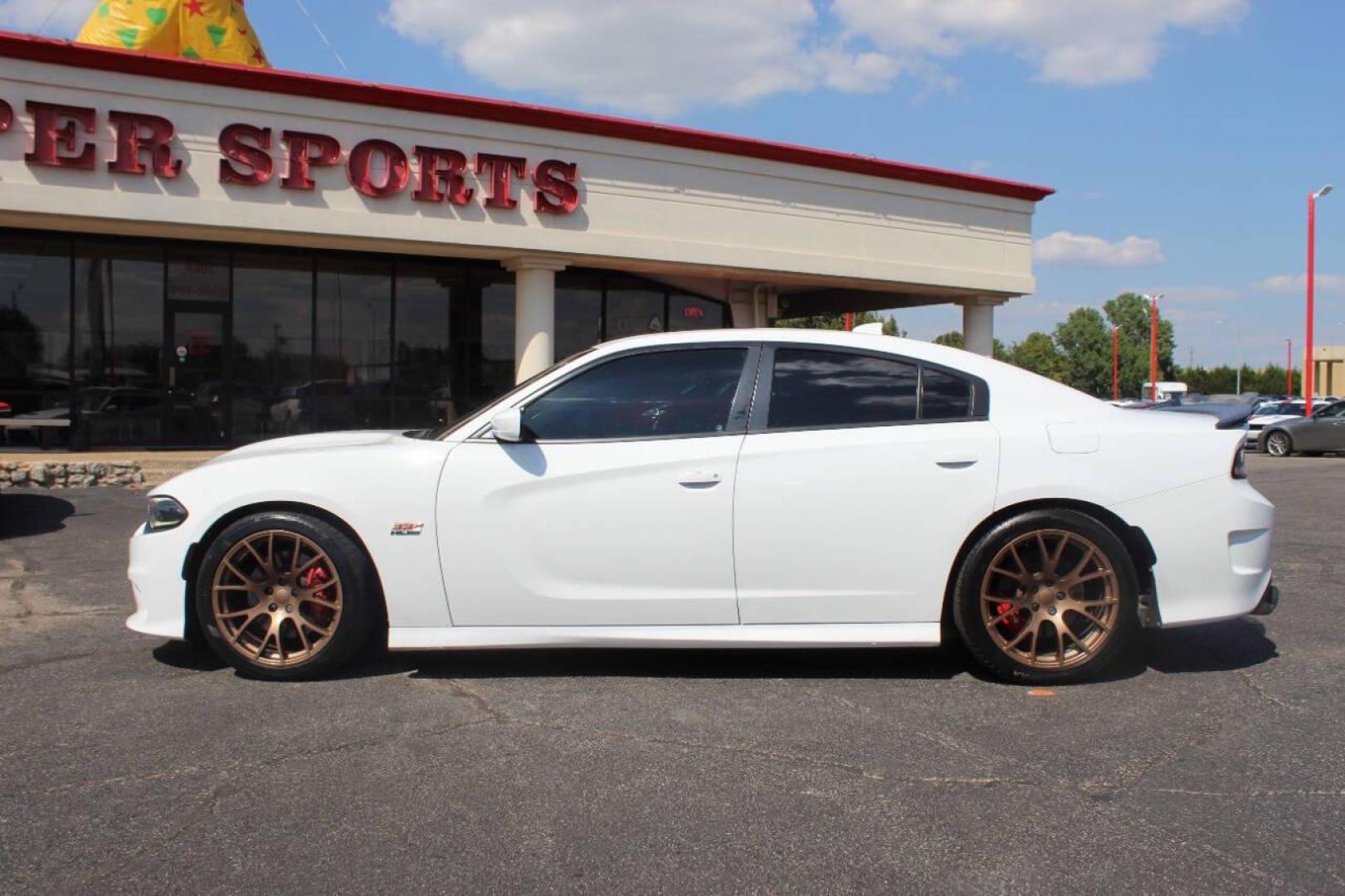 2018 White Dodge Charger SRT 392 (2C3CDXGJ8JH) with an 6.4L V8 OHV 16V engine, 5A transmission, located at 4301 NW 39th , Oklahoma City, OK, 73112, (405) 949-5600, 35.512135, -97.598671 - NO DRIVERS LICENCE -NO FULL COVERAGE INSURANCE - NO CREDIT CHECK. COME ON OVER TO SUPERSPORTS, TAKE A LOOK AND TEST DRIVE. PLEASE GIVE US A CALL AT (405) 949-5600. NO LICENCIA DE CONDUCIR - NO SEGURO DE COBERTURA TOTAL - NO VERIFICACION DE CREDITO. VISITENOS EN SUPERSPORTS, MIRE NUESTRO - Photo#5