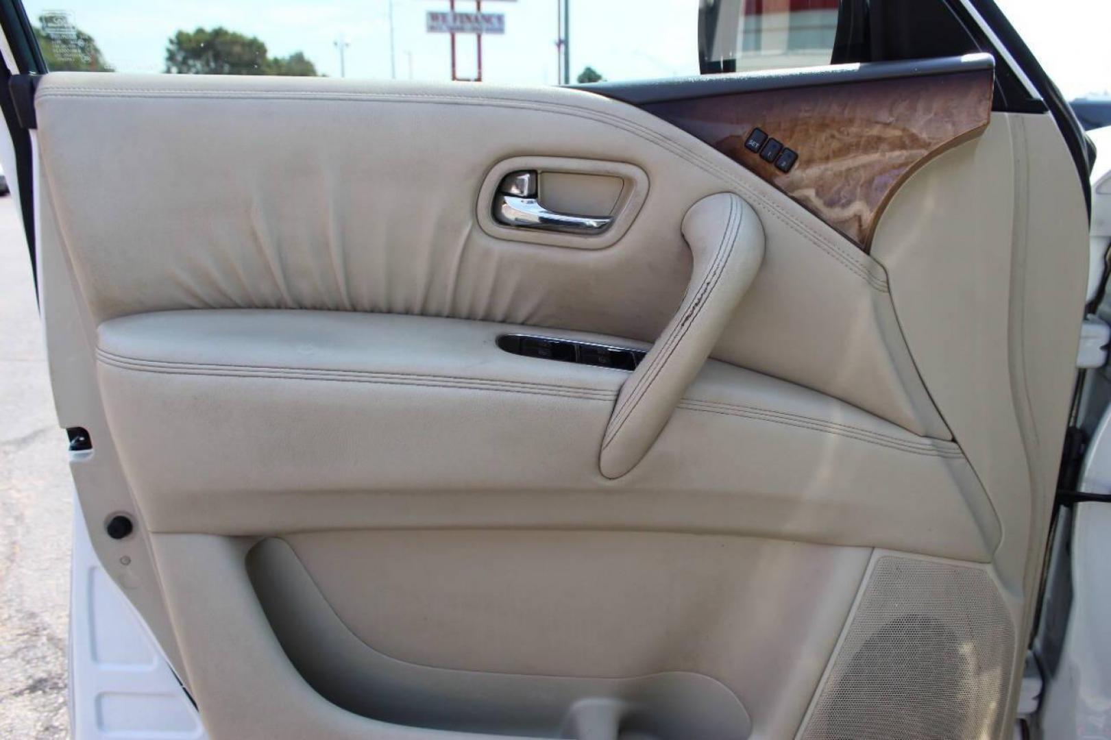 2011 White Infiniti QX56 4WD (JN8AZ2NE6B9) with an 5.6L V8 DOHC 32V engine, 5-Speed Automatic transmission, located at 4301 NW 39th , Oklahoma City, OK, 73112, (405) 949-5600, 35.512135, -97.598671 - NO DRIVERS LICENCE -NO FULL COVERAGE INSURANCE - NO CREDIT CHECK. COME ON OVER TO SUPERSPORTS, TAKE A LOOK AND TEST DRIVE. PLEASE GIVE US A CALL AT (405) 949-5600. NO LICENCIA DE CONDUCIR - NO SEGURO DE COBERTURA TOTAL - NO VERIFICACION DE CREDITO. VISITENOS EN SUPERSPORTS, MIRE NUESTRO - Photo#18