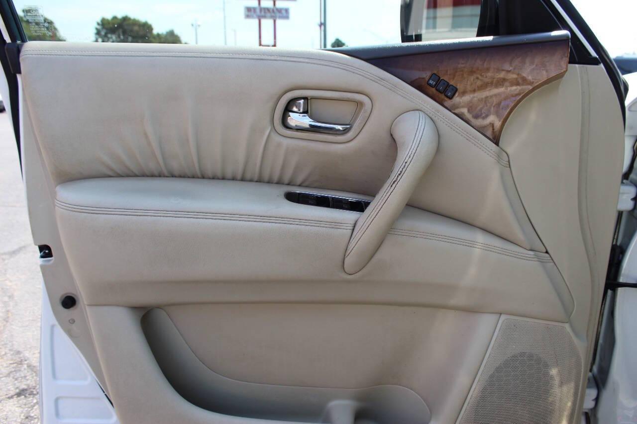 2011 White Infiniti QX56 4WD (JN8AZ2NE6B9) with an 5.6L V8 DOHC 32V engine, 5-Speed Automatic transmission, located at 4301 NW 39th , Oklahoma City, OK, 73112, (405) 949-5600, 35.512135, -97.598671 - NO DRIVERS LICENCE -NO FULL COVERAGE INSURANCE - NO CREDIT CHECK. COME ON OVER TO SUPERSPORTS, TAKE A LOOK AND TEST DRIVE. PLEASE GIVE US A CALL AT (405) 949-5600. NO LICENCIA DE CONDUCIR - NO SEGURO DE COBERTURA TOTAL - NO VERIFICACION DE CREDITO. VISITENOS EN SUPERSPORTS, MIRE NUESTRO - Photo#19