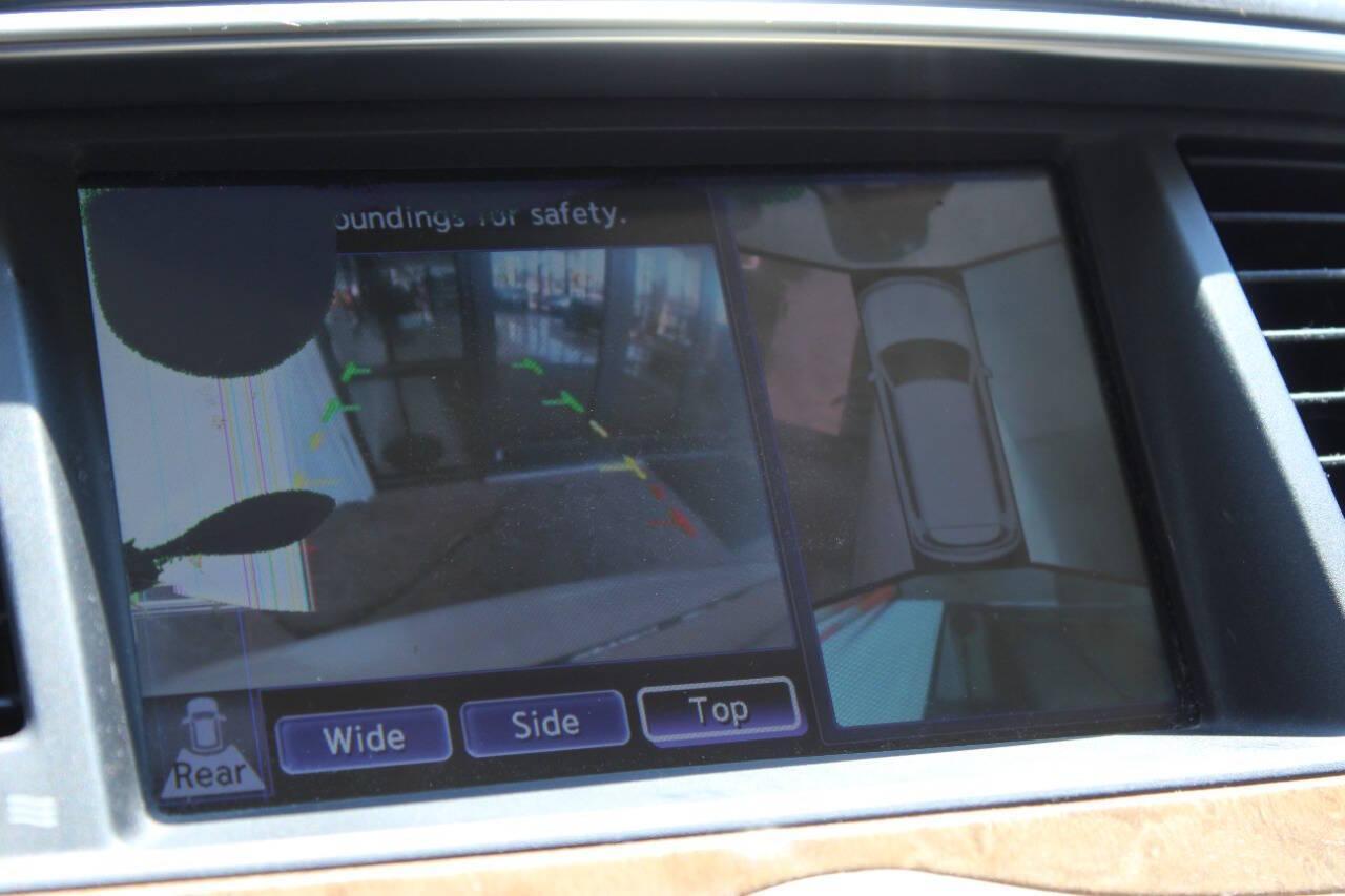 2011 White Infiniti QX56 4WD (JN8AZ2NE6B9) with an 5.6L V8 DOHC 32V engine, 5-Speed Automatic transmission, located at 4301 NW 39th , Oklahoma City, OK, 73112, (405) 949-5600, 35.512135, -97.598671 - NO DRIVERS LICENCE -NO FULL COVERAGE INSURANCE - NO CREDIT CHECK. COME ON OVER TO SUPERSPORTS, TAKE A LOOK AND TEST DRIVE. PLEASE GIVE US A CALL AT (405) 949-5600. NO LICENCIA DE CONDUCIR - NO SEGURO DE COBERTURA TOTAL - NO VERIFICACION DE CREDITO. VISITENOS EN SUPERSPORTS, MIRE NUESTRO - Photo#21