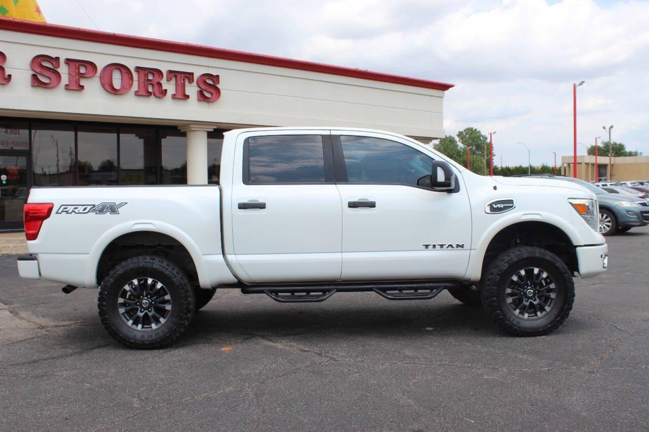 2017 White Nissan Titan Platinum Reserve Crew Cab 4WD (1N6AA1E58HN) with an 5.6L V8 DOHC 32V engine, 6A transmission, located at 4301 NW 39th , Oklahoma City, OK, 73112, (405) 949-5600, 35.512135, -97.598671 - NO DRIVERS LICENCE -NO FULL COVERAGE INSURANCE - NO CREDIT CHECK. COME ON OVER TO SUPERSPORTS, TAKE A LOOK AND TEST DRIVE. PLEASE GIVE US A CALL AT (405) 949-5600. NO LICENCIA DE CONDUCIR - NO SEGURO DE COBERTURA TOTAL - NO VERIFICACION DE CREDITO. VISITENOS EN SUPERSPORTS, MIRE NUESTRO - Photo#2