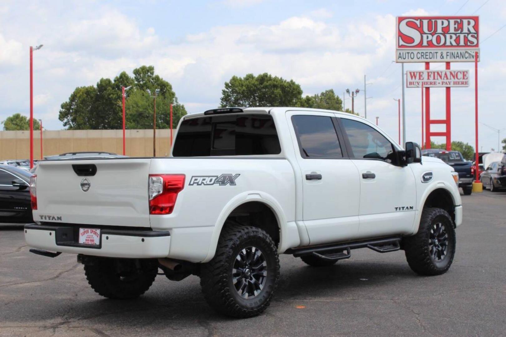 2017 White Nissan Titan Platinum Reserve Crew Cab 4WD (1N6AA1E58HN) with an 5.6L V8 DOHC 32V engine, 6A transmission, located at 4301 NW 39th , Oklahoma City, OK, 73112, (405) 949-5600, 35.512135, -97.598671 - Photo#3
