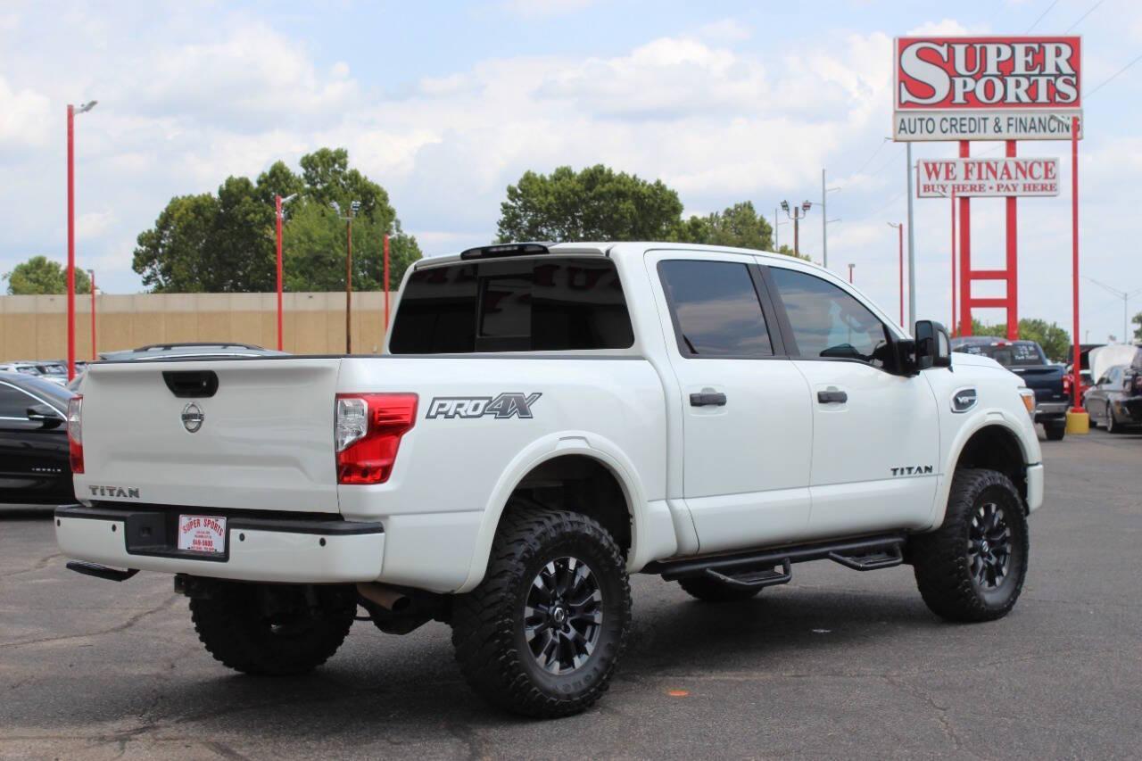 2017 White Nissan Titan Platinum Reserve Crew Cab 4WD (1N6AA1E58HN) with an 5.6L V8 DOHC 32V engine, 6A transmission, located at 4301 NW 39th , Oklahoma City, OK, 73112, (405) 949-5600, 35.512135, -97.598671 - NO DRIVERS LICENCE -NO FULL COVERAGE INSURANCE - NO CREDIT CHECK. COME ON OVER TO SUPERSPORTS, TAKE A LOOK AND TEST DRIVE. PLEASE GIVE US A CALL AT (405) 949-5600. NO LICENCIA DE CONDUCIR - NO SEGURO DE COBERTURA TOTAL - NO VERIFICACION DE CREDITO. VISITENOS EN SUPERSPORTS, MIRE NUESTRO - Photo#3