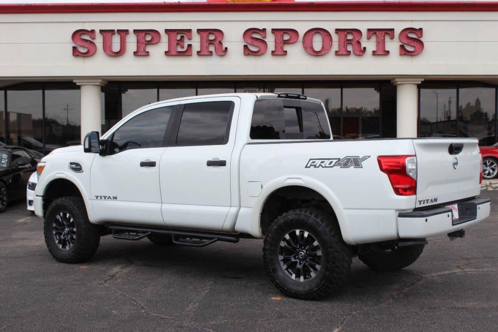2017 White Nissan Titan Platinum Reserve Crew Cab 4WD (1N6AA1E58HN) with an 5.6L V8 DOHC 32V engine, 6A transmission, located at 4301 NW 39th , Oklahoma City, OK, 73112, (405) 949-5600, 35.512135, -97.598671 - Photo#4