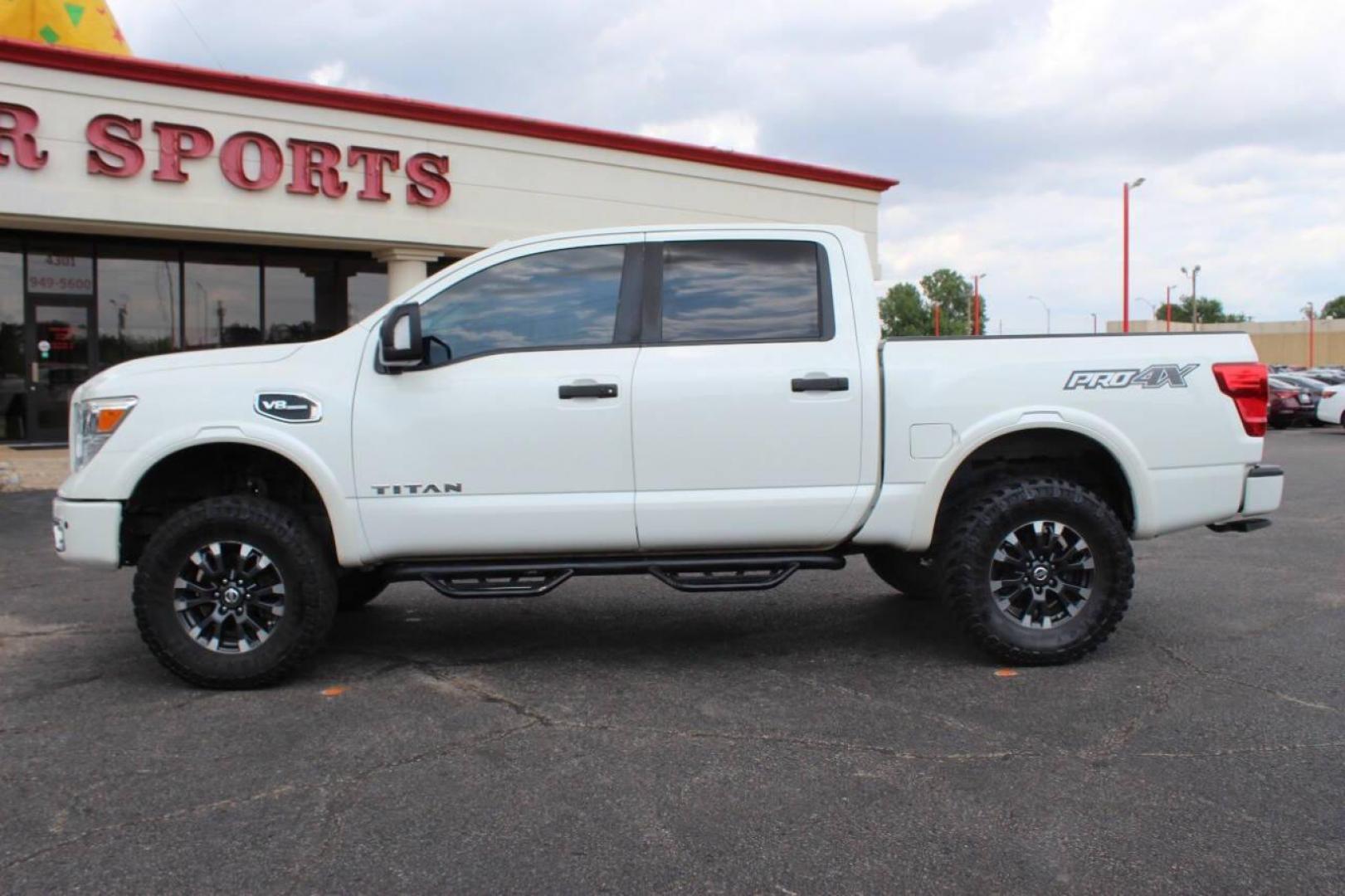 2017 White Nissan Titan Platinum Reserve Crew Cab 4WD (1N6AA1E58HN) with an 5.6L V8 DOHC 32V engine, 6A transmission, located at 4301 NW 39th , Oklahoma City, OK, 73112, (405) 949-5600, 35.512135, -97.598671 - Photo#5
