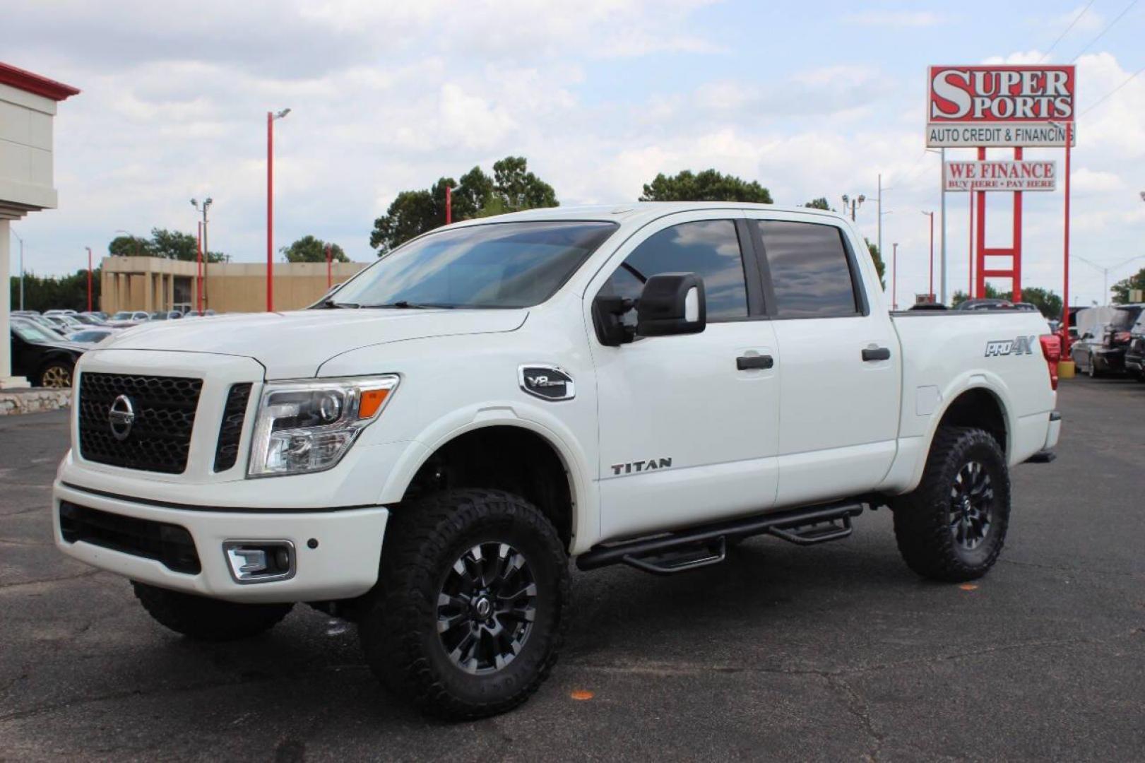 2017 White Nissan Titan Platinum Reserve Crew Cab 4WD (1N6AA1E58HN) with an 5.6L V8 DOHC 32V engine, 6A transmission, located at 4301 NW 39th , Oklahoma City, OK, 73112, (405) 949-5600, 35.512135, -97.598671 - Photo#6
