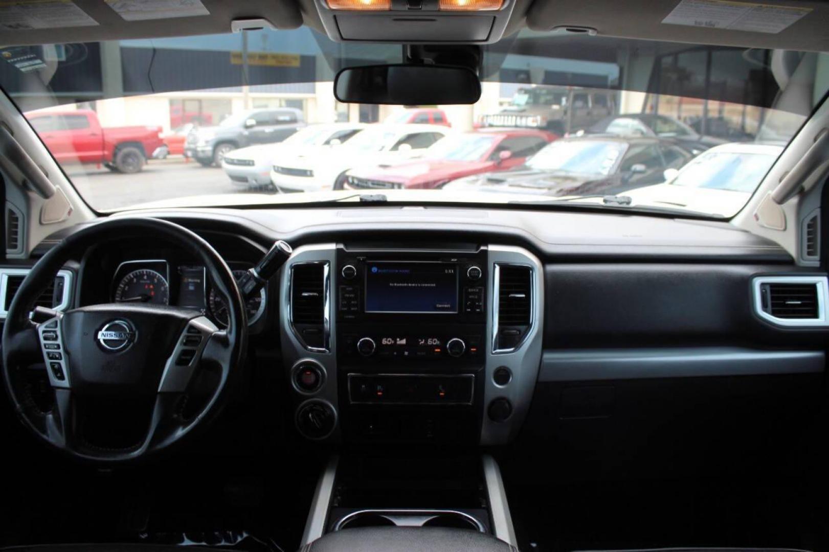2017 White Nissan Titan Platinum Reserve Crew Cab 4WD (1N6AA1E58HN) with an 5.6L V8 DOHC 32V engine, 6A transmission, located at 4301 NW 39th , Oklahoma City, OK, 73112, (405) 949-5600, 35.512135, -97.598671 - Photo#16