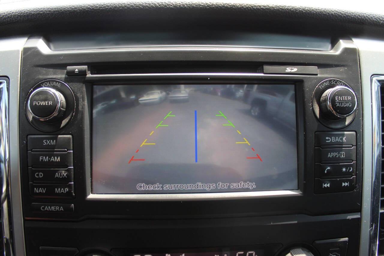 2017 White Nissan Titan Platinum Reserve Crew Cab 4WD (1N6AA1E58HN) with an 5.6L V8 DOHC 32V engine, 6A transmission, located at 4301 NW 39th , Oklahoma City, OK, 73112, (405) 949-5600, 35.512135, -97.598671 - NO DRIVERS LICENCE -NO FULL COVERAGE INSURANCE - NO CREDIT CHECK. COME ON OVER TO SUPERSPORTS, TAKE A LOOK AND TEST DRIVE. PLEASE GIVE US A CALL AT (405) 949-5600. NO LICENCIA DE CONDUCIR - NO SEGURO DE COBERTURA TOTAL - NO VERIFICACION DE CREDITO. VISITENOS EN SUPERSPORTS, MIRE NUESTRO - Photo#17