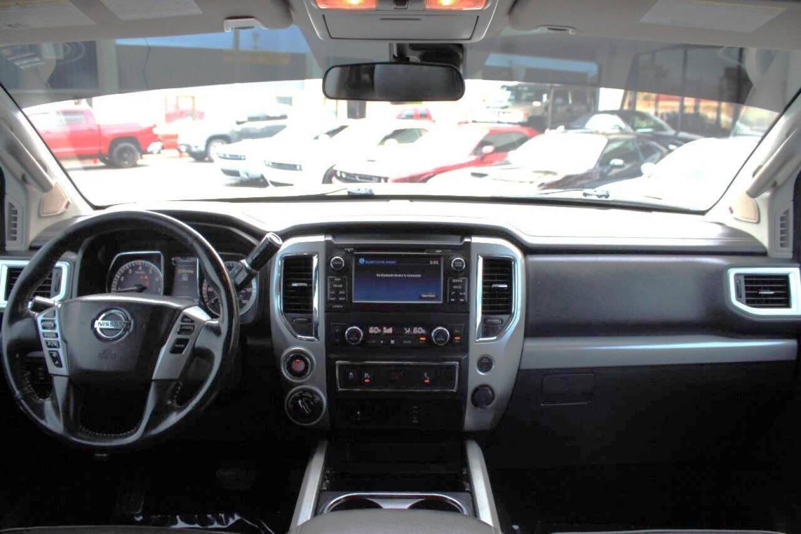 2017 White Nissan Titan Platinum Reserve Crew Cab 4WD (1N6AA1E58HN) with an 5.6L V8 DOHC 32V engine, 6A transmission, located at 4301 NW 39th , Oklahoma City, OK, 73112, (405) 949-5600, 35.512135, -97.598671 - NO DRIVERS LICENCE -NO FULL COVERAGE INSURANCE - NO CREDIT CHECK. COME ON OVER TO SUPERSPORTS, TAKE A LOOK AND TEST DRIVE. PLEASE GIVE US A CALL AT (405) 949-5600. NO LICENCIA DE CONDUCIR - NO SEGURO DE COBERTURA TOTAL - NO VERIFICACION DE CREDITO. VISITENOS EN SUPERSPORTS, MIRE NUESTRO - Photo#16